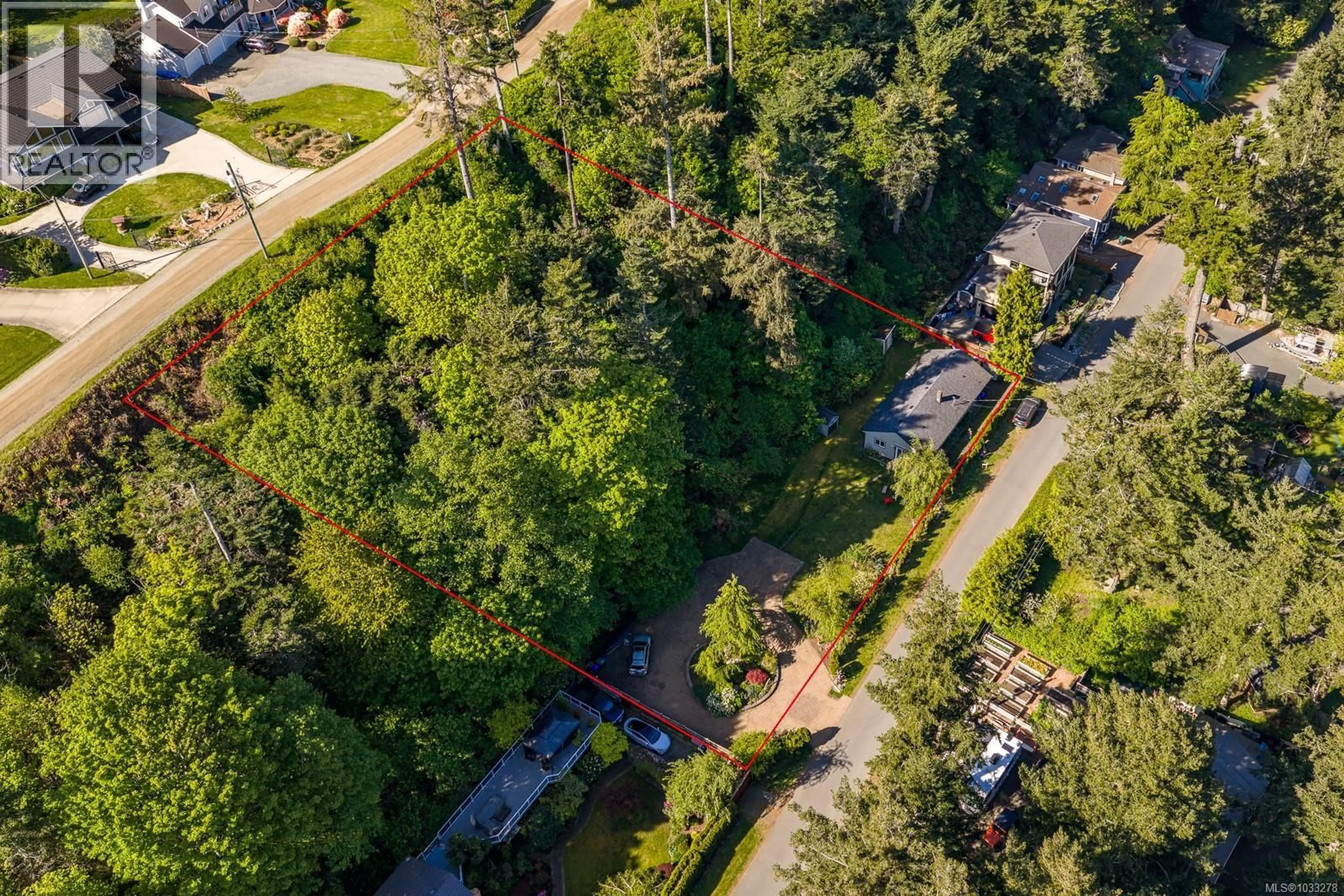 A pic from outside/outdoor area/front of a property/back of a property/a pic from drone, forest/trees view for 1545 KYE BAY ROAD, Comox British Columbia V9M3T7
