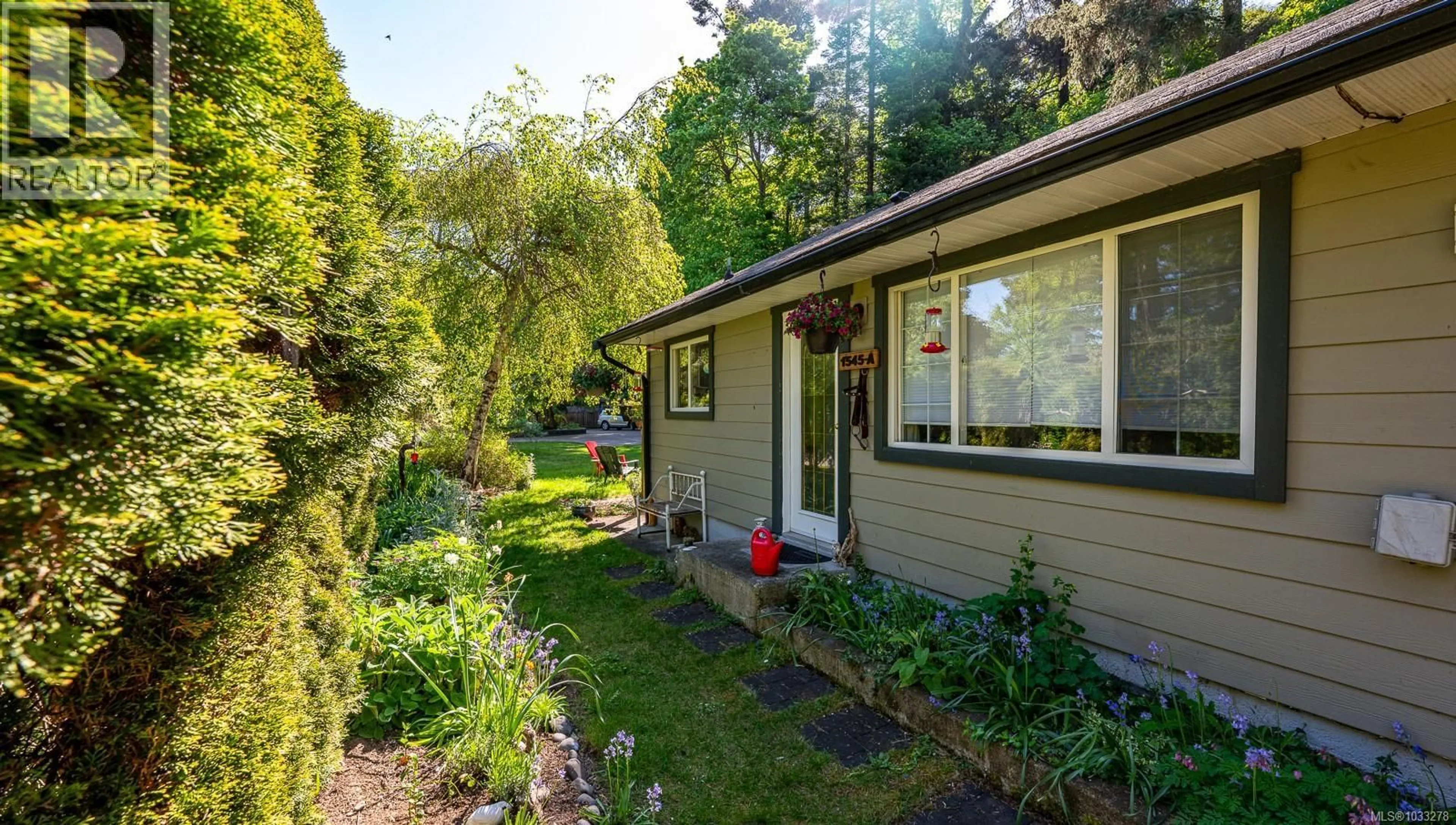 Home with vinyl exterior material, street for 1545 KYE BAY ROAD, Comox British Columbia V9M3T7