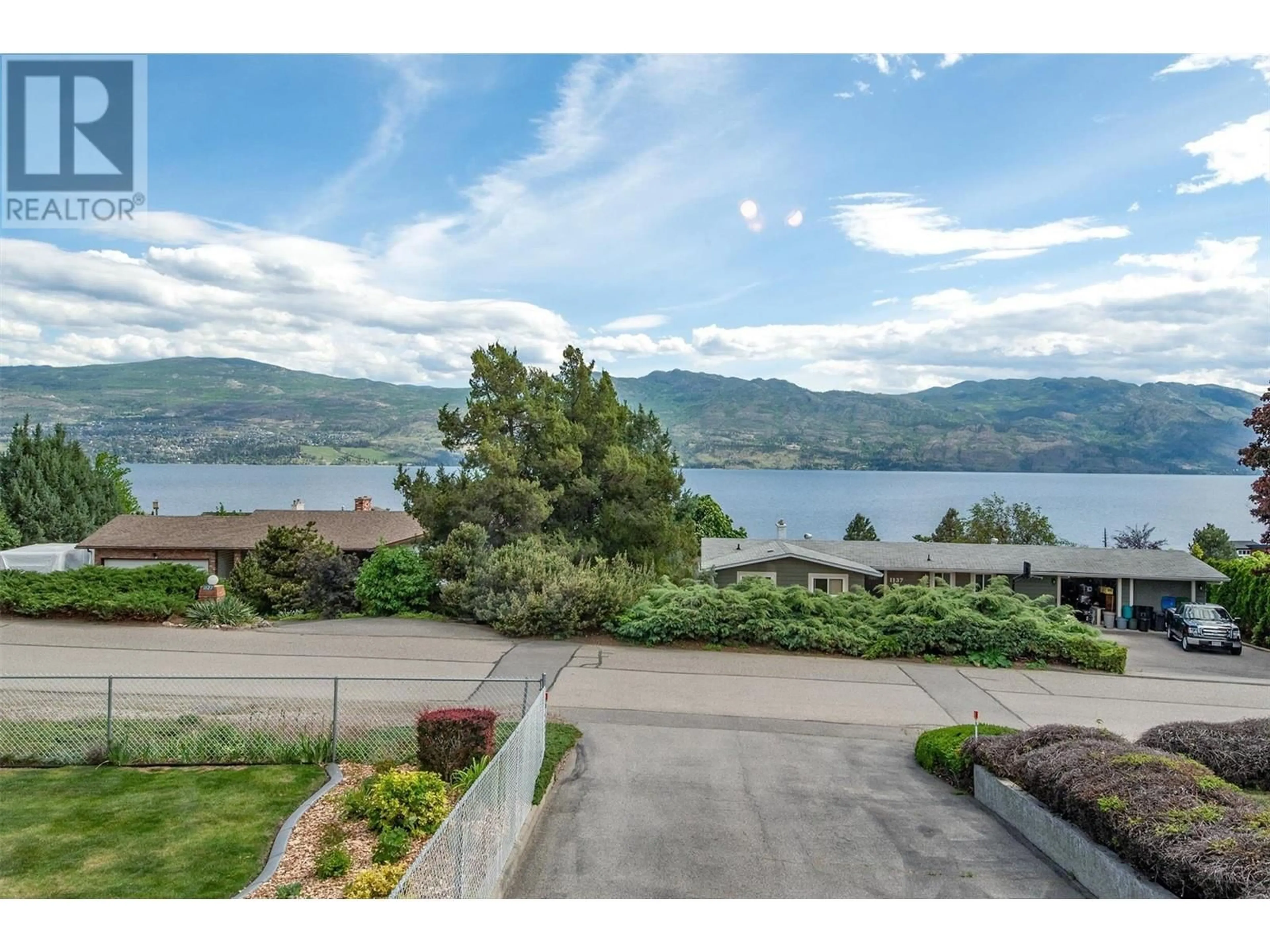 A pic from outside/outdoor area/front of a property/back of a property/a pic from drone, water/lake/river/ocean view for 1122 Allison Place, West Kelowna British Columbia V1Z2E3