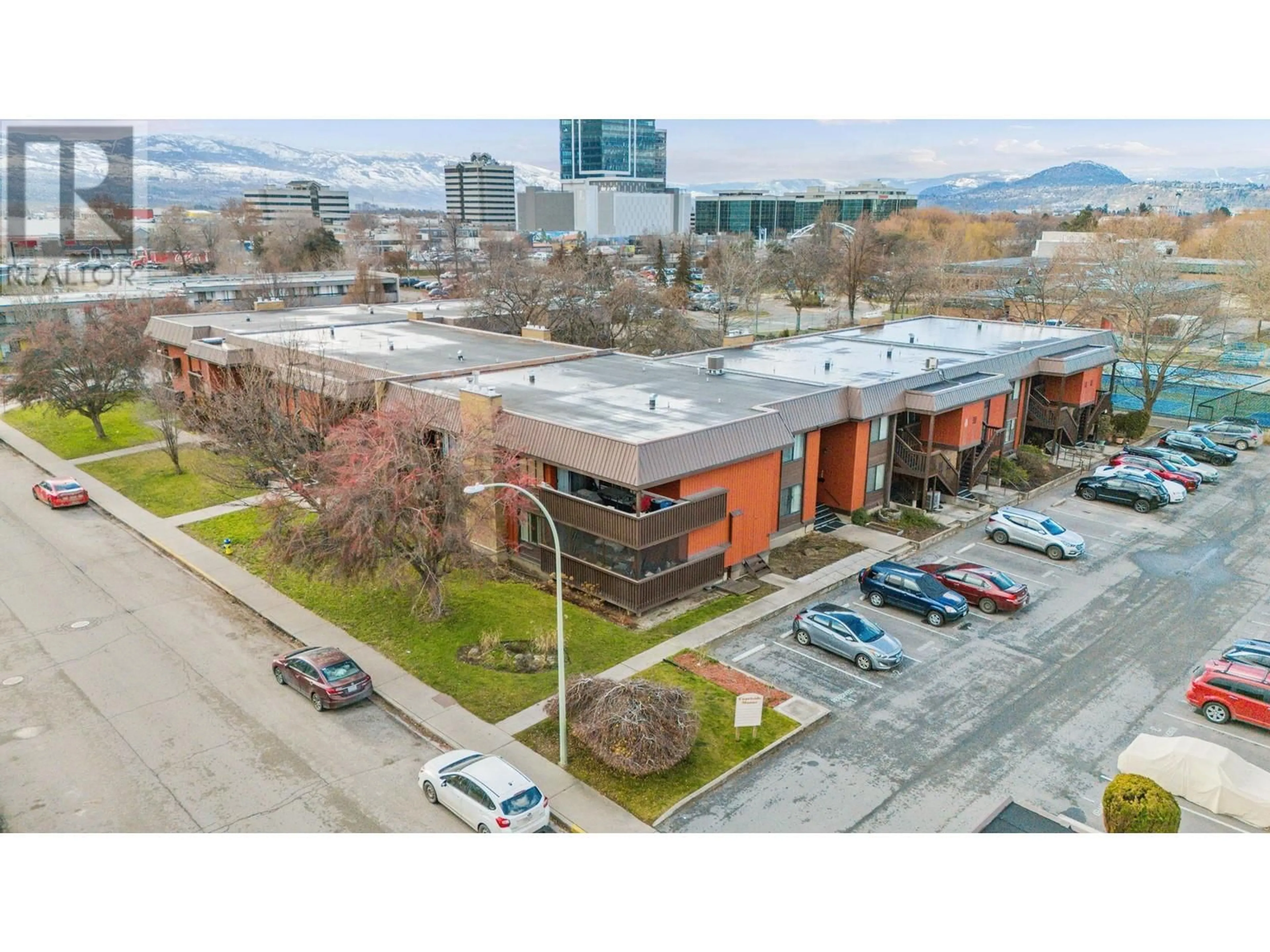 A pic from outside/outdoor area/front of a property/back of a property/a pic from drone, unknown for 1870 Parkinson Way Unit# 210, Kelowna British Columbia V1Y8C9