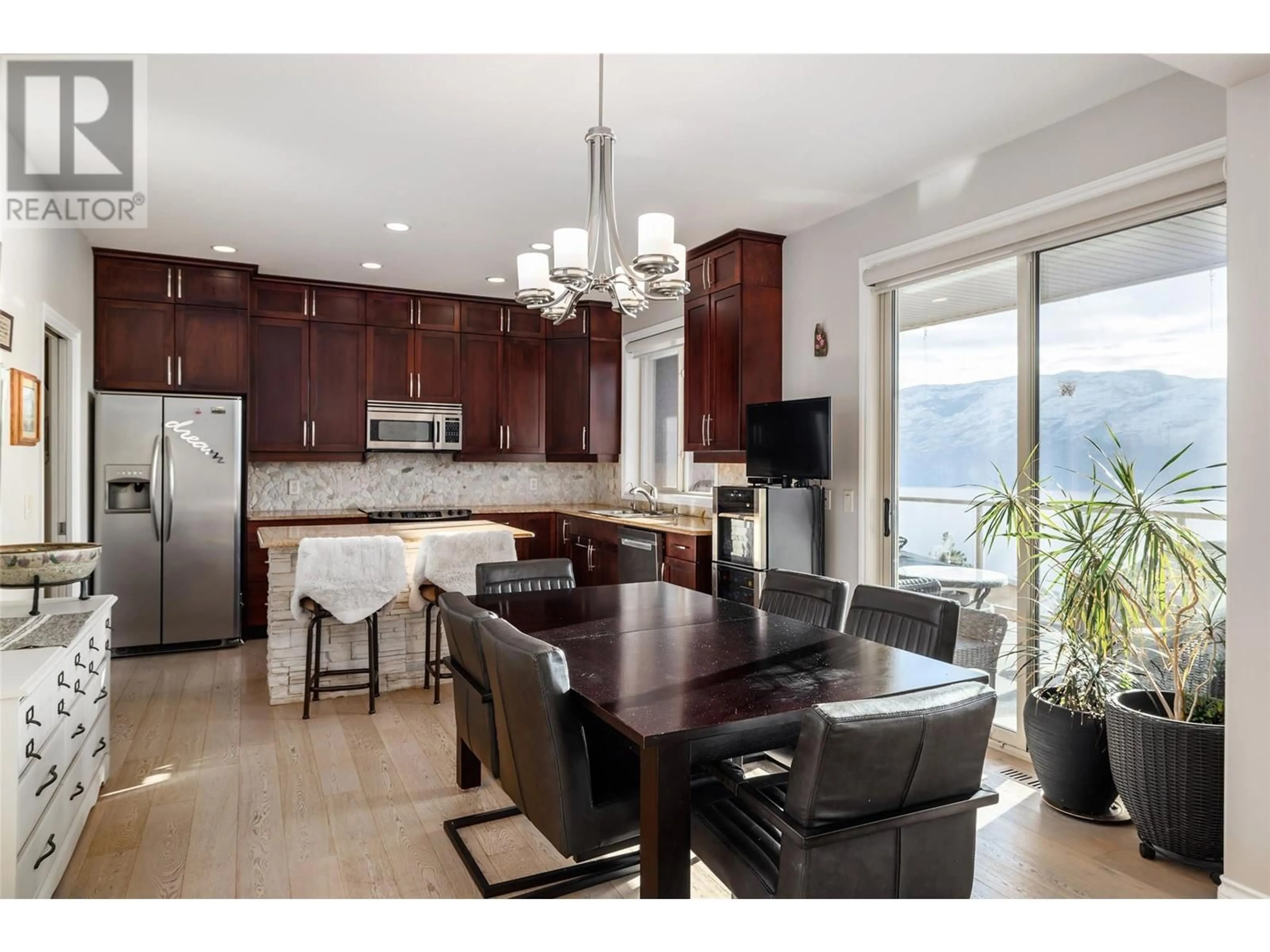 Open concept kitchen, wood/laminate floor for 5165 Trepanier Bench Road Unit# 256, Peachland British Columbia V0H1X2