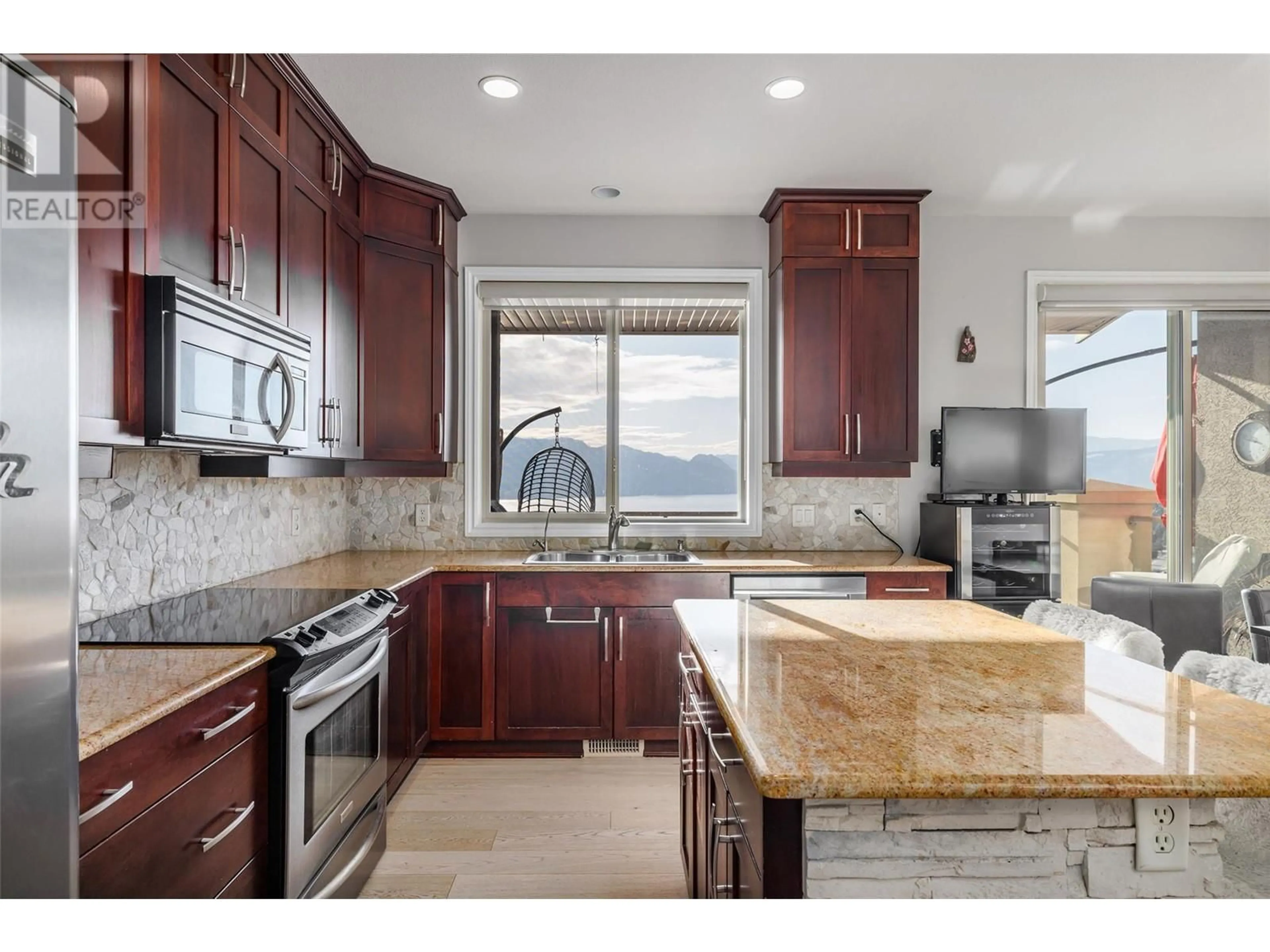 Open concept kitchen, ceramic/tile floor for 5165 Trepanier Bench Road Unit# 256, Peachland British Columbia V0H1X2