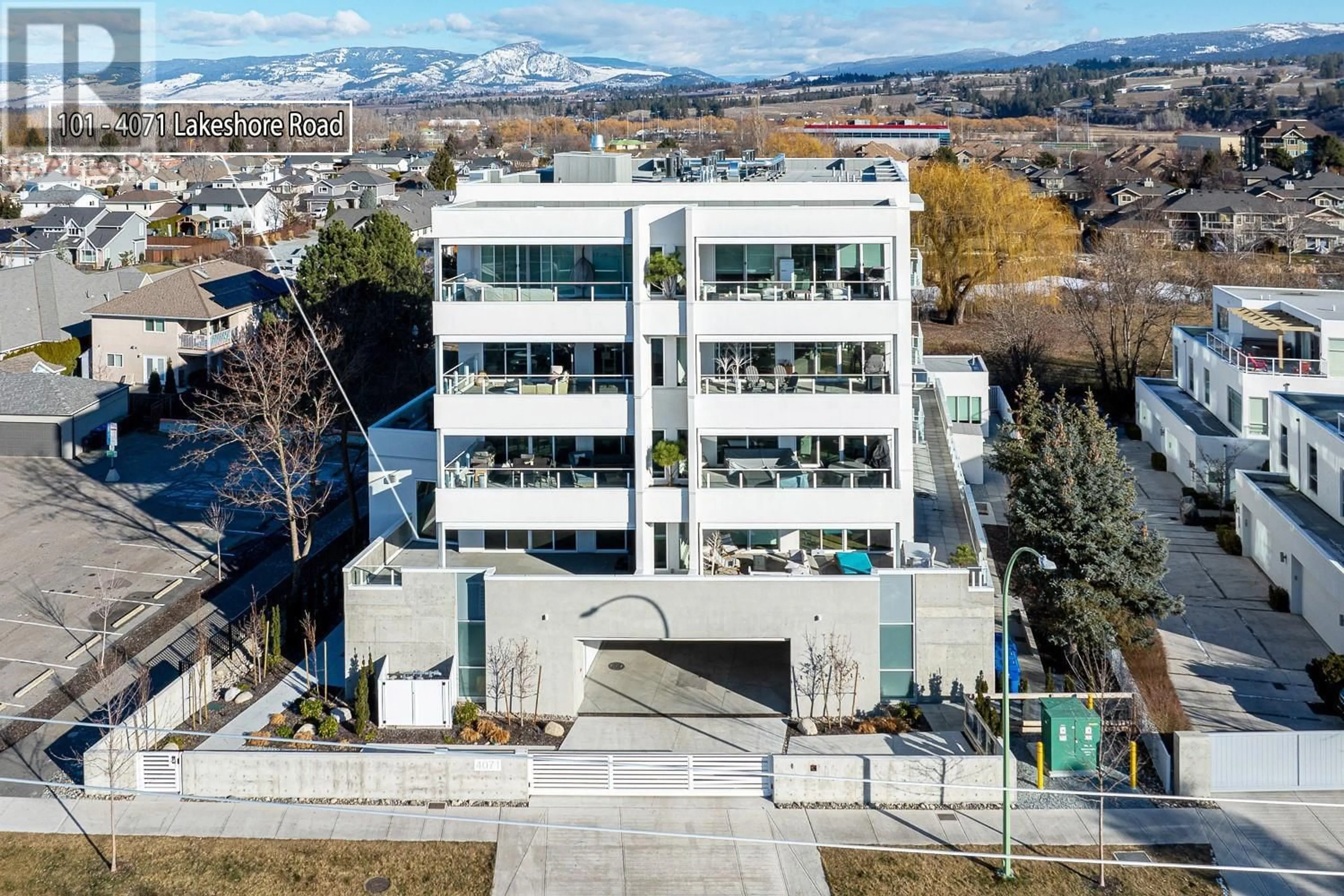 A pic from outside/outdoor area/front of a property/back of a property/a pic from drone, building for 4071 Lakeshore Road Unit# 101, Kelowna British Columbia V1W1V7