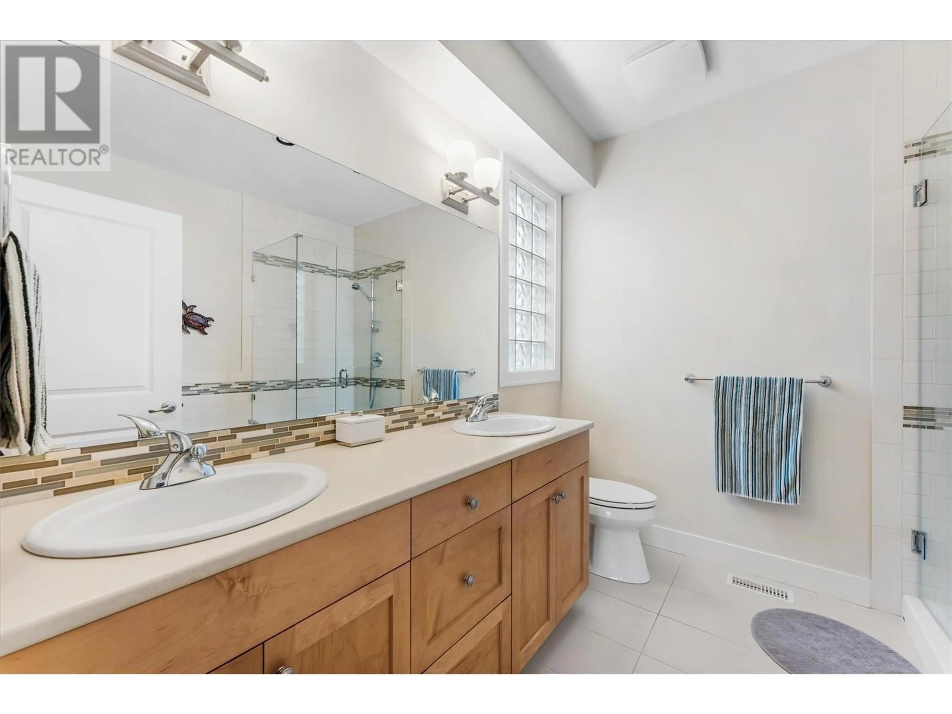 Standard bathroom, ceramic/tile floor for 13089 Gibbons Drive, Lake Country British Columbia V4V2S4