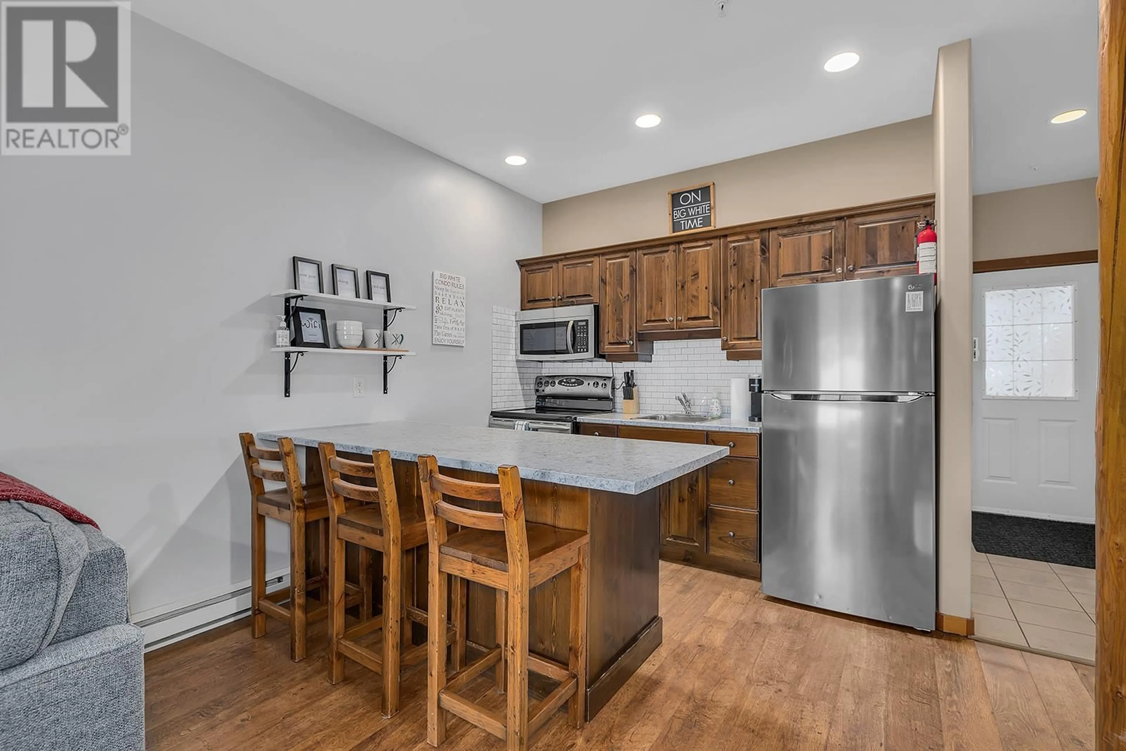 Standard kitchen, wood/laminate floor for 5015 Snowbird Way Unit# 28, Big White British Columbia V1P1P3