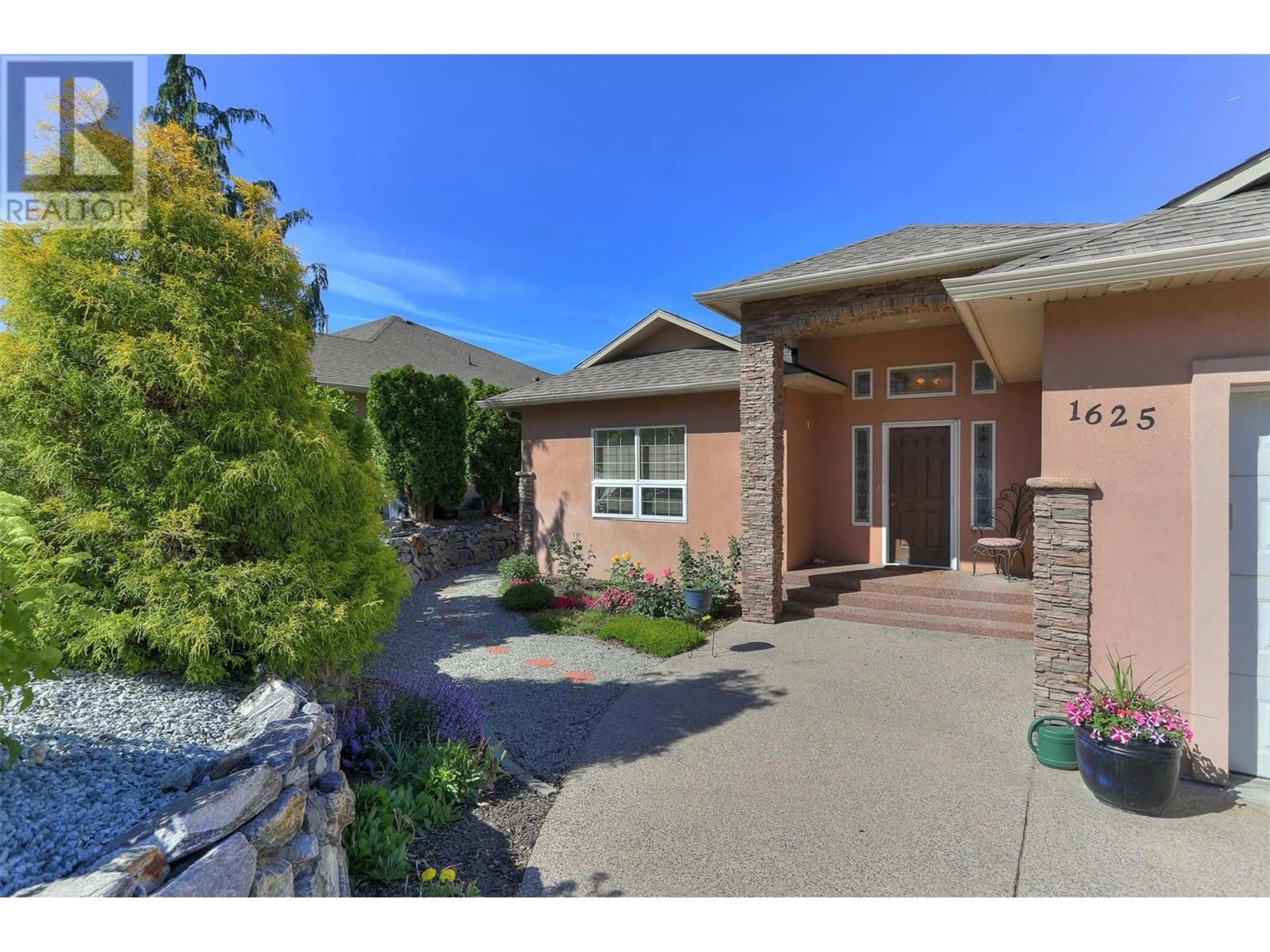 Home with brick exterior material, street for 1625 Merlot Drive, West Kelowna British Columbia V4T2X7