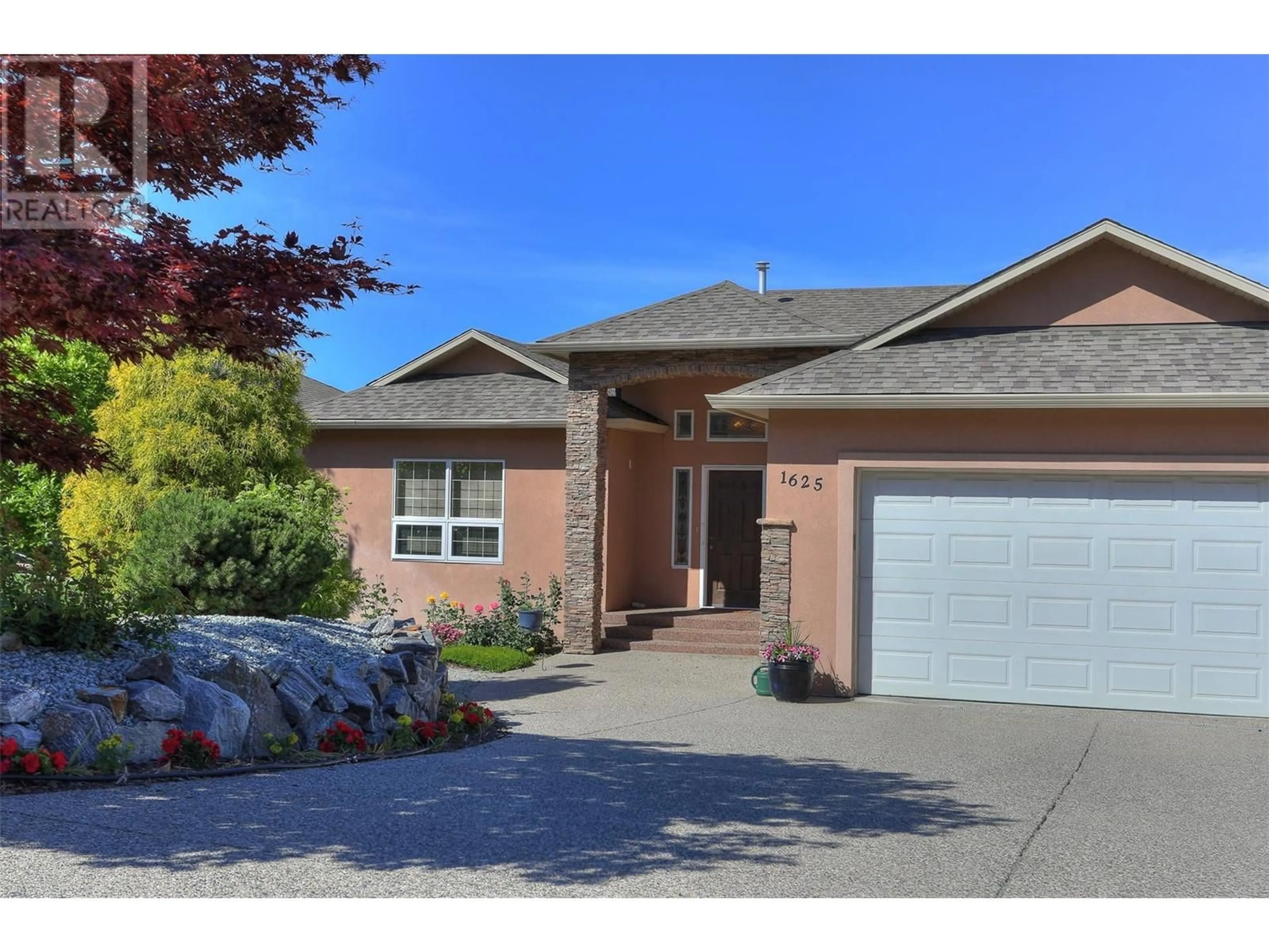 Home with brick exterior material, street for 1625 Merlot Drive, West Kelowna British Columbia V4T2X7