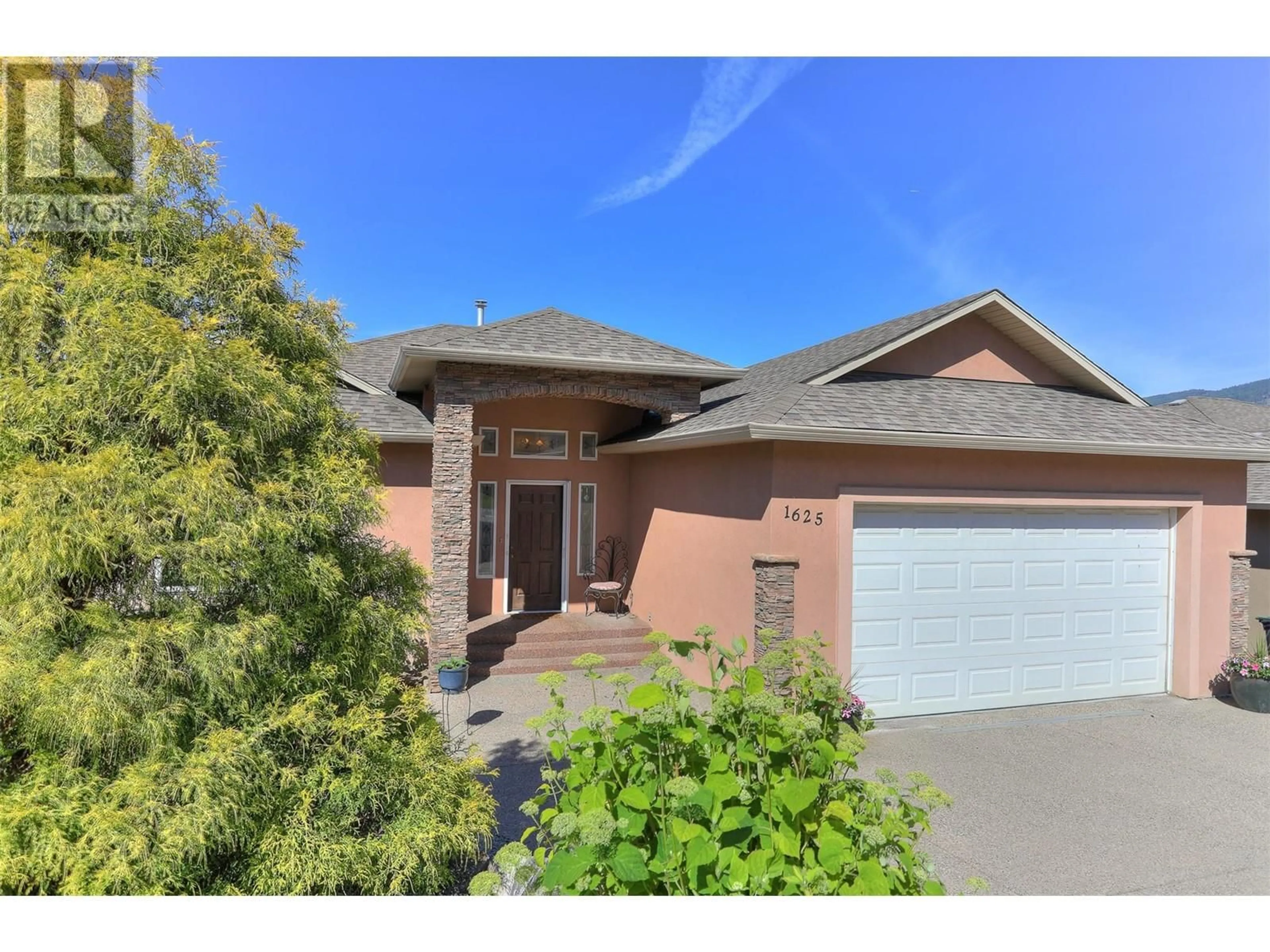 Home with brick exterior material, street for 1625 Merlot Drive, West Kelowna British Columbia V4T2X7