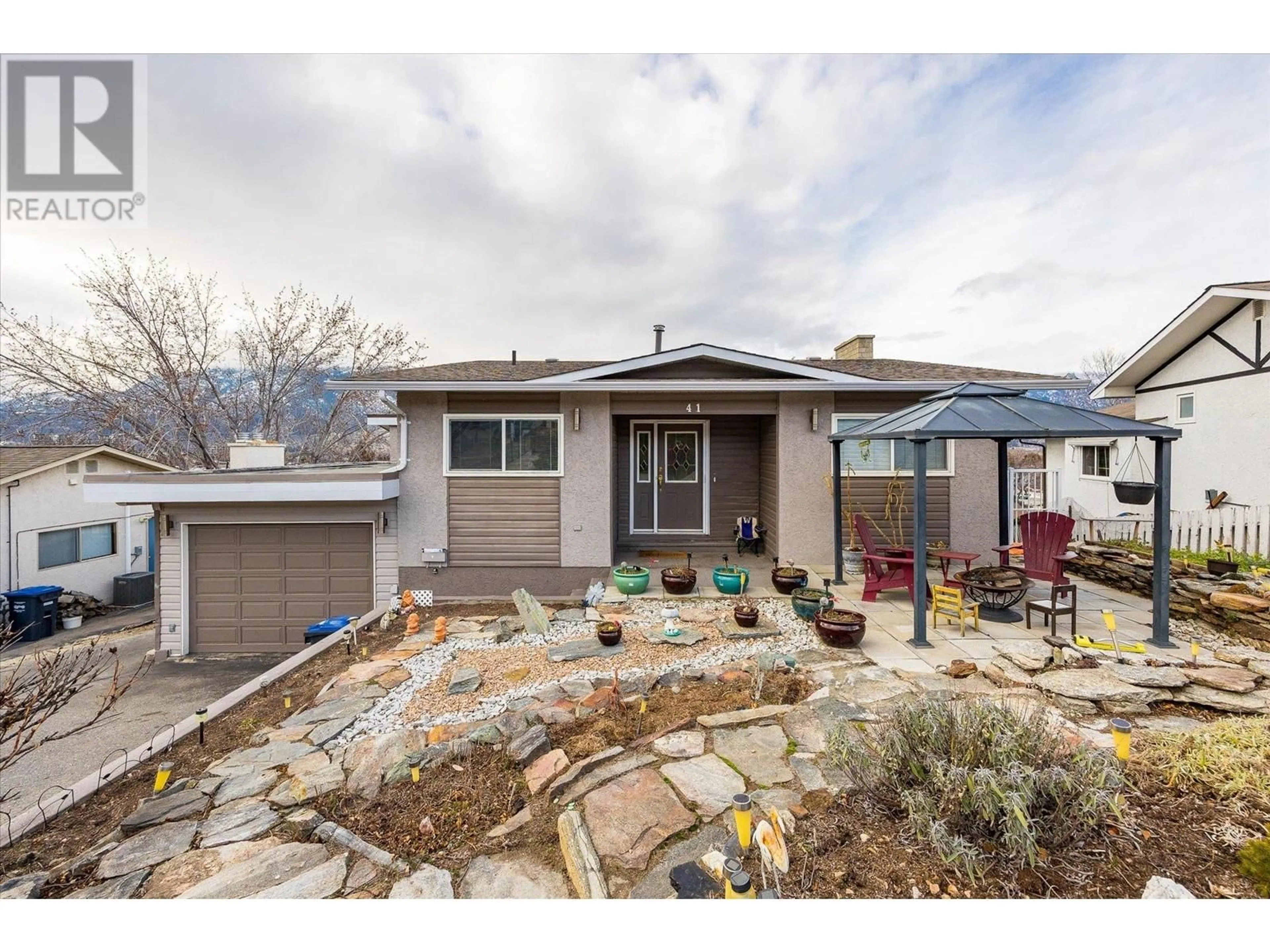 Home with vinyl exterior material, mountain view for 41 GREENWOOD Drive, Penticton British Columbia V2A7P8