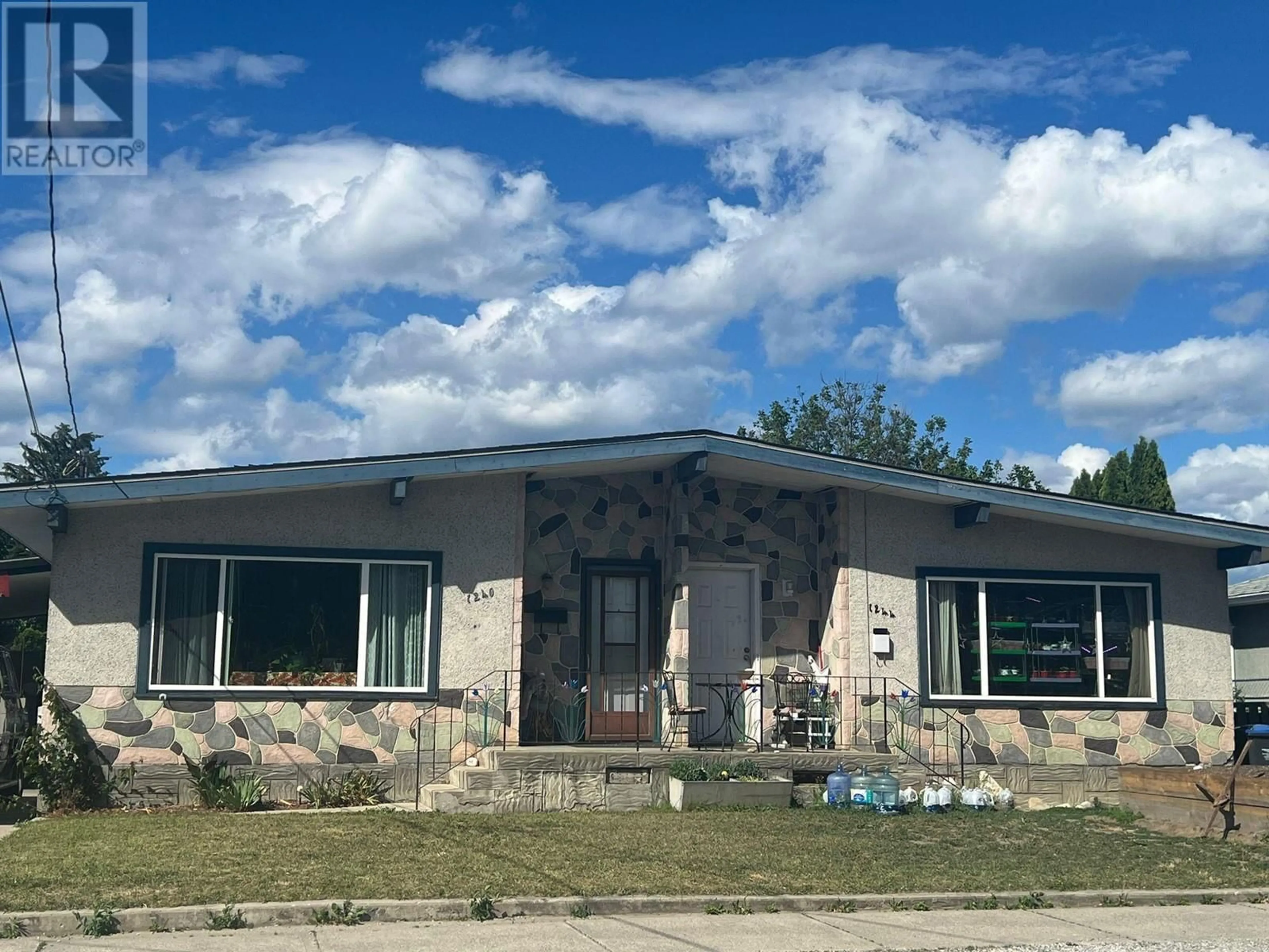 Home with vinyl exterior material, building for 1240-1244 Centennial Crescent, Kelowna British Columbia V1Y6K2