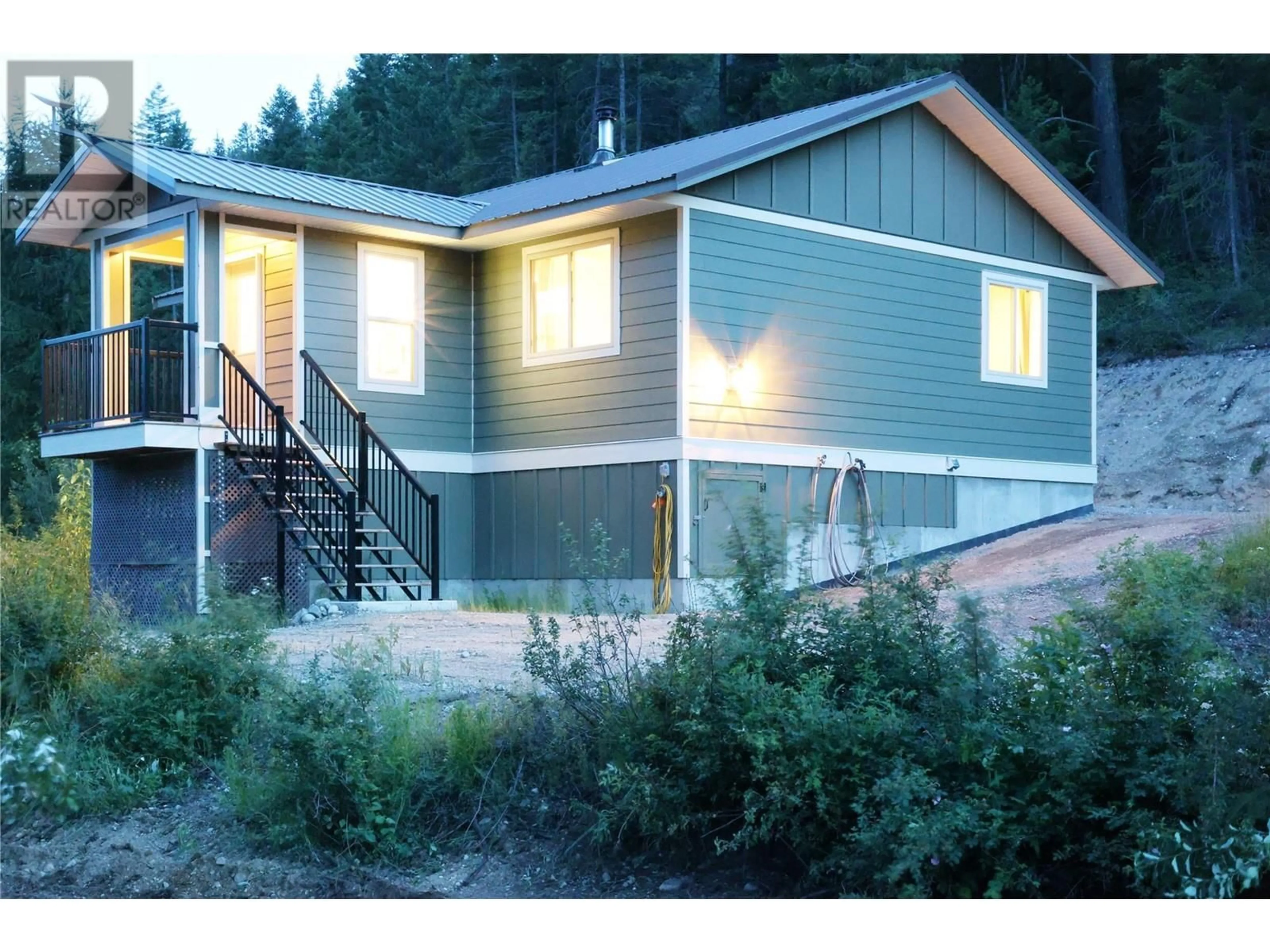 Home with vinyl exterior material, street for 3445 BLYTHE-RHONE ROAD, Westbridge British Columbia V0H1Y0