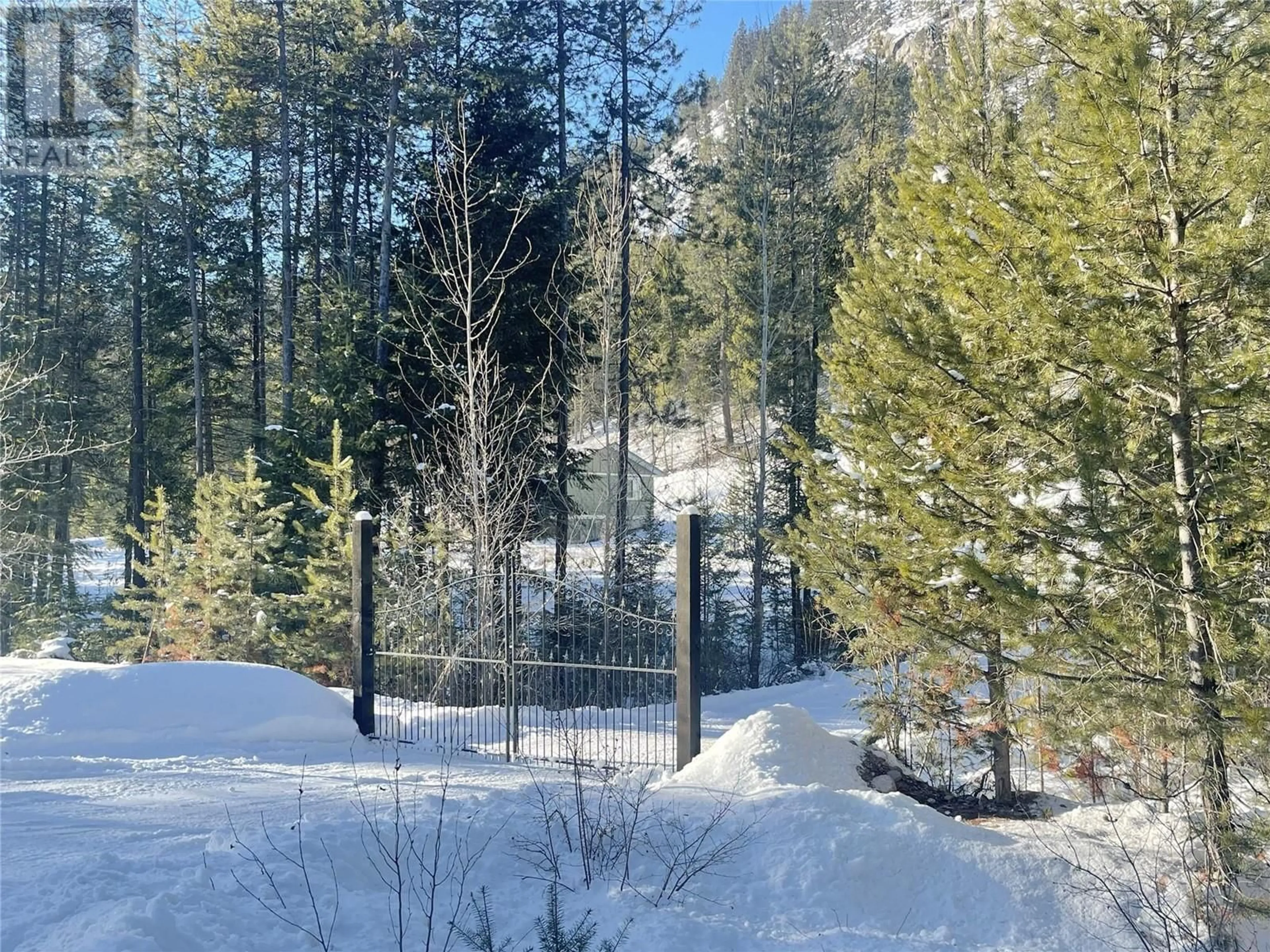 A pic from outside/outdoor area/front of a property/back of a property/a pic from drone, forest/trees view for 3445 Blythe-Rhone Road, Westbridge British Columbia V0H1Y0