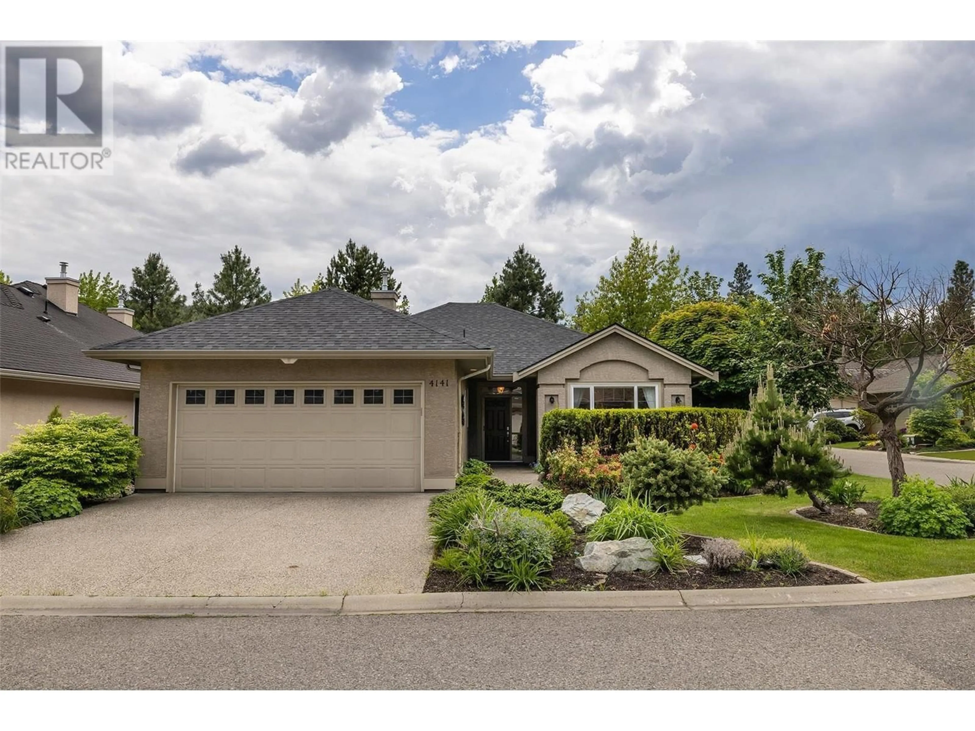 Home with vinyl exterior material, street for 4141 GALLAGHERS FOREST ROAD SOUTH, Kelowna British Columbia V1W5E4