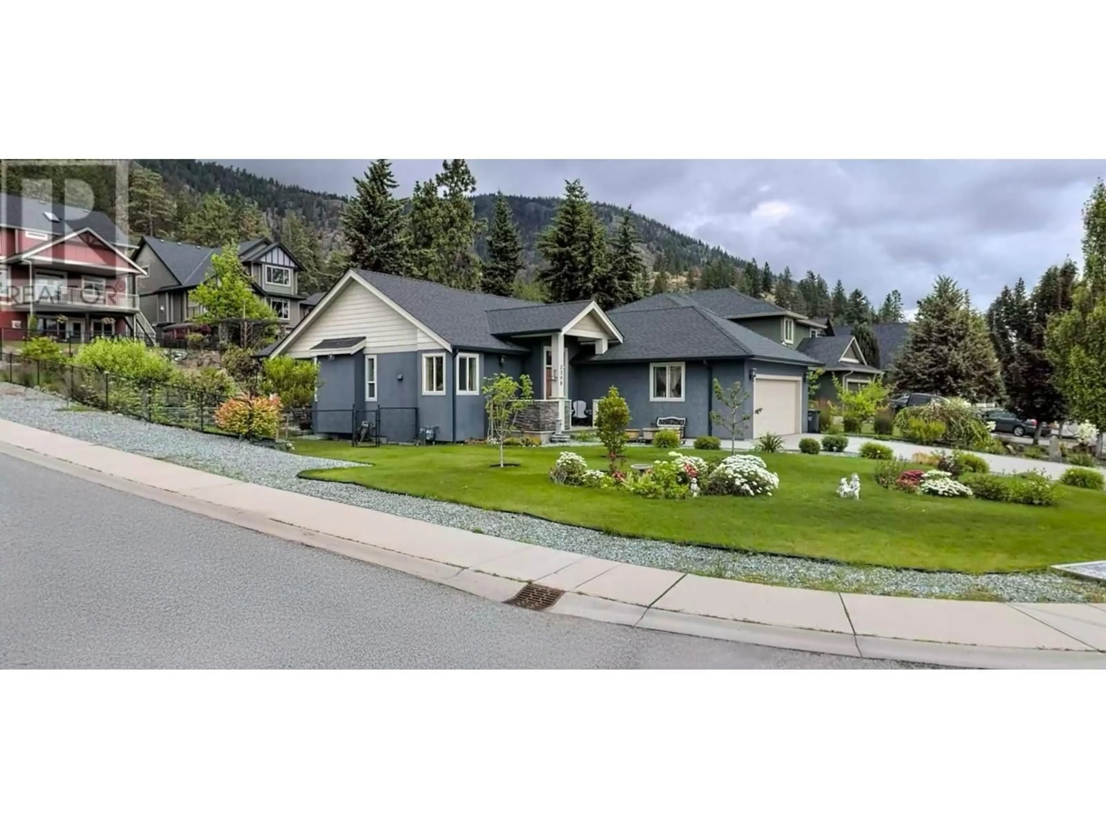 Home with vinyl exterior material, mountain view for 2398 Cobblestone Road, West Kelowna British Columbia V4T3A7