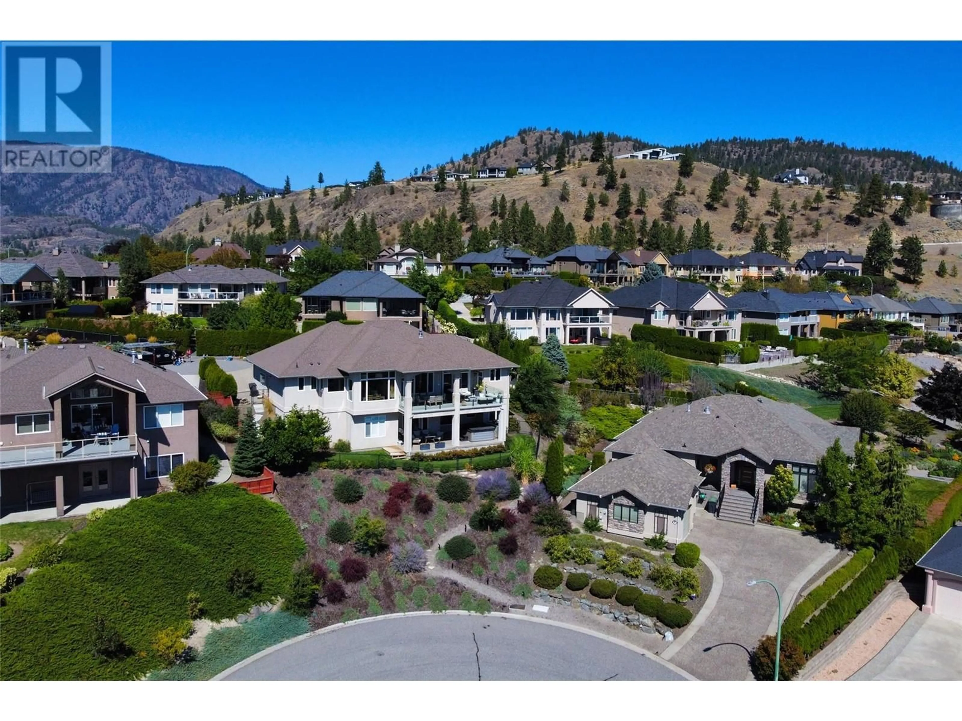 A pic from outside/outdoor area/front of a property/back of a property/a pic from drone, mountain view for 1608 Braeburn Court, West Kelowna British Columbia V4T2V5