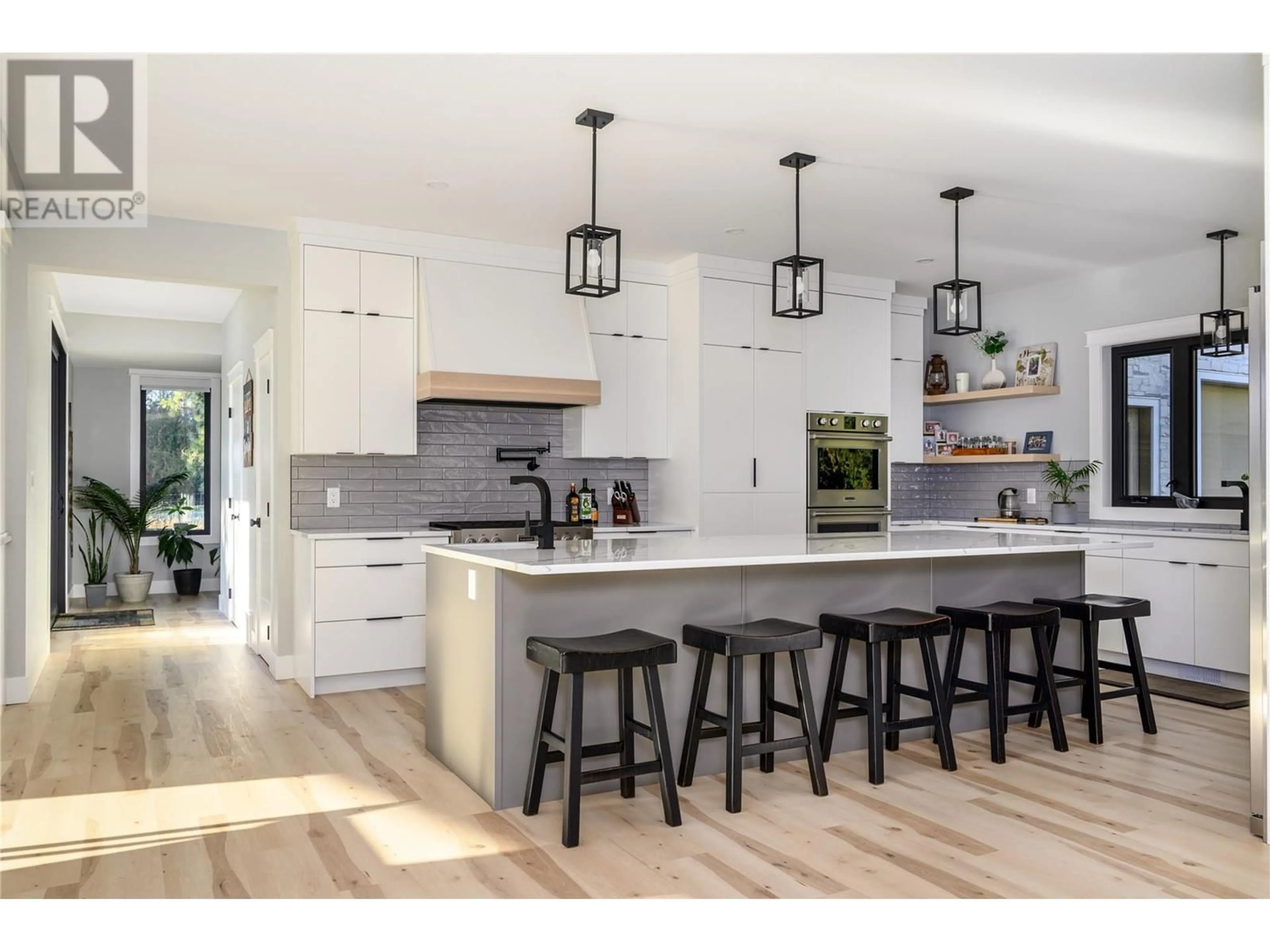 Open concept kitchen, wood/laminate floor for 50 FOXWOOD ROAD, Grindrod British Columbia V0E1Y0