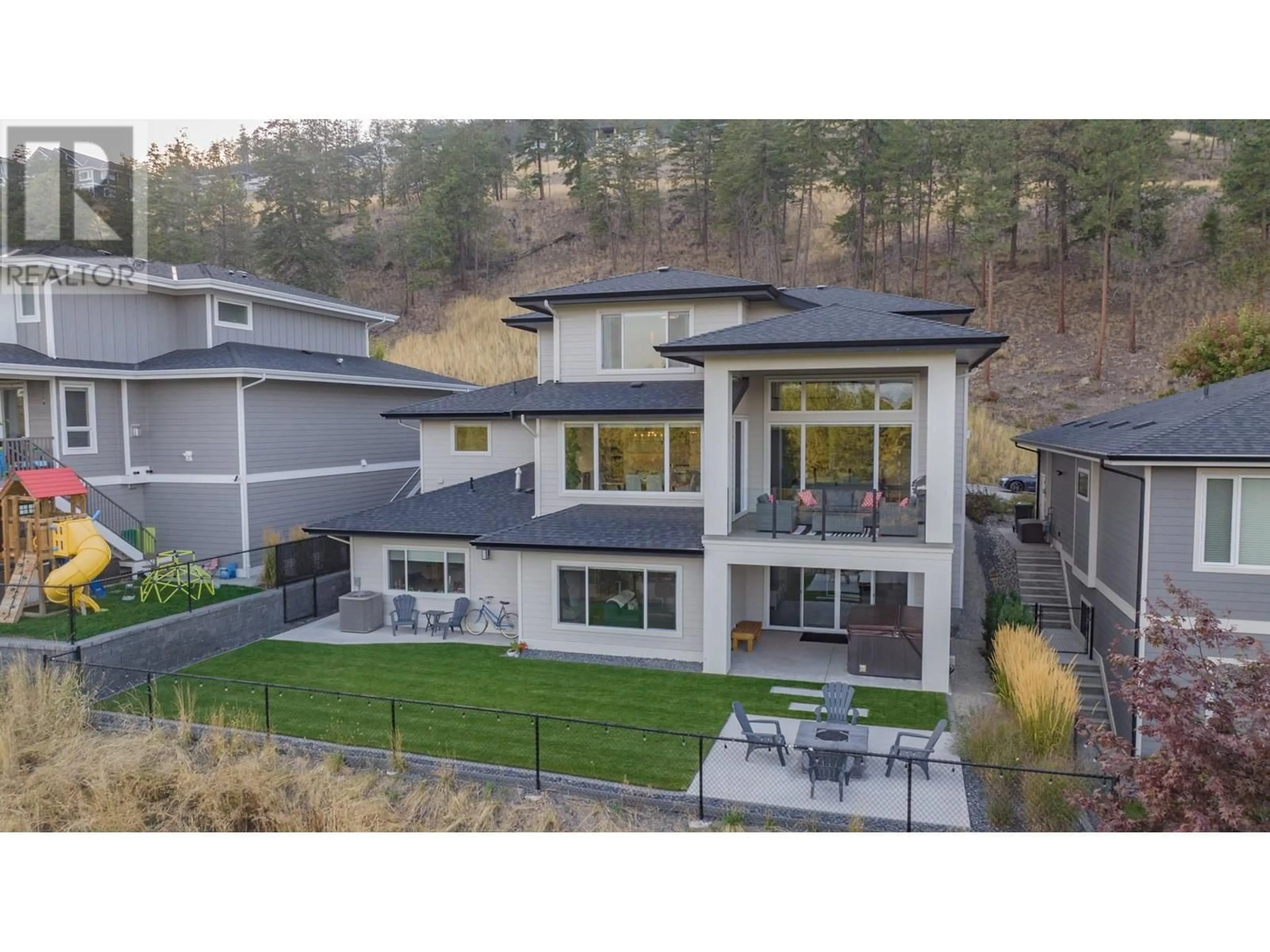 A pic from outside/outdoor area/front of a property/back of a property/a pic from drone, mountain view for 139 Forest Edge Place, Kelowna British Columbia V1V3G3