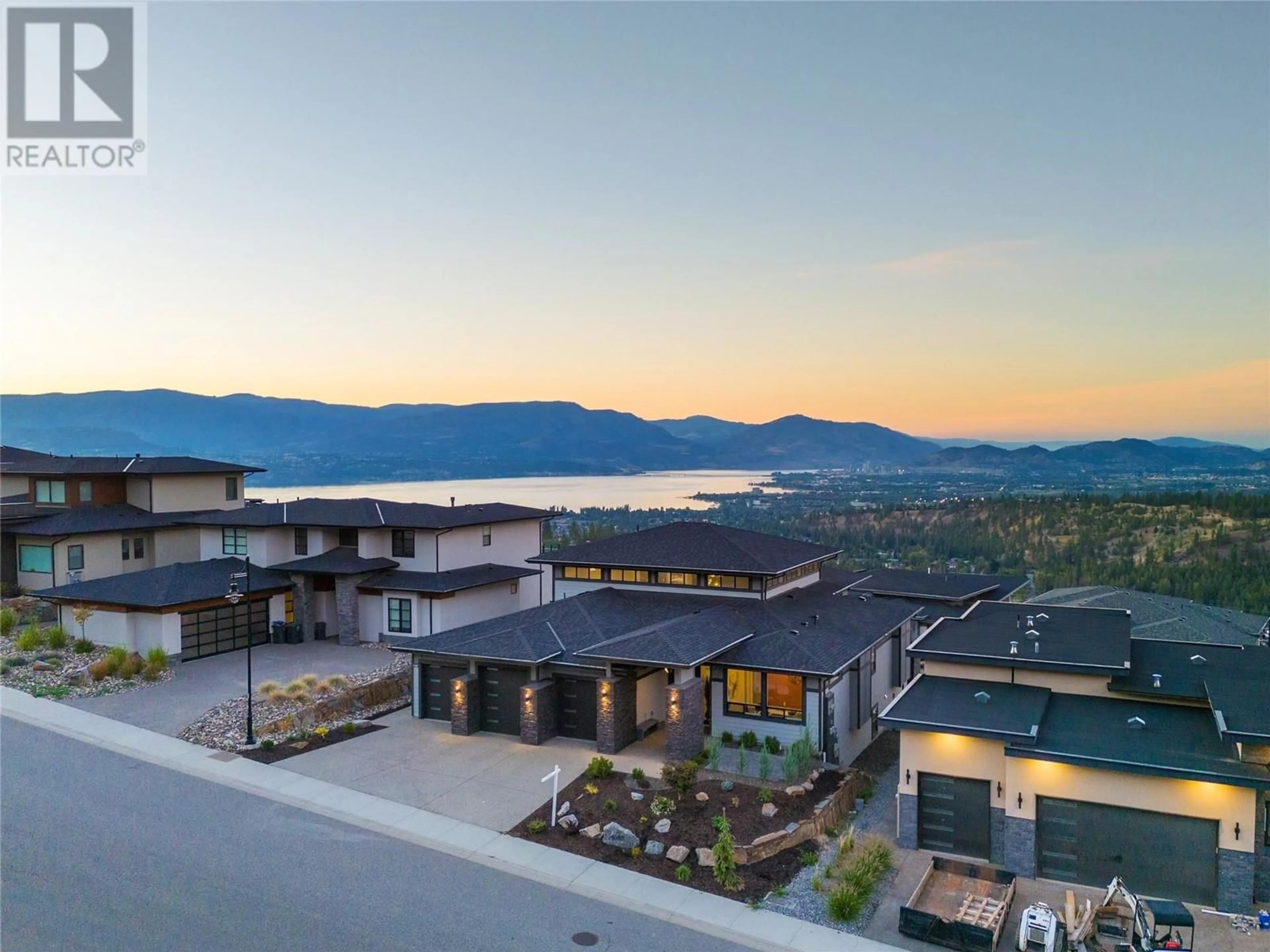 A pic from outside/outdoor area/front of a property/back of a property/a pic from drone, mountain view for 1088 Clarance Avenue, Kelowna British Columbia V1W5M6