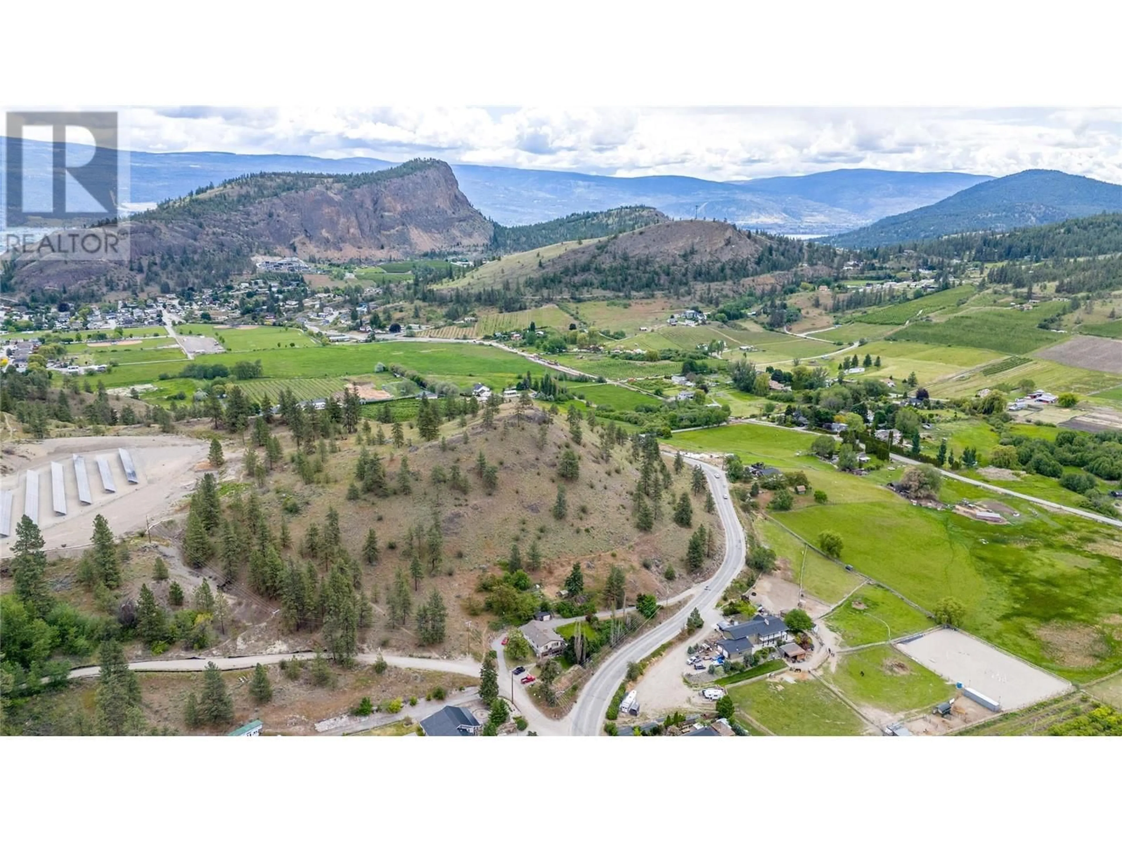 A pic from outside/outdoor area/front of a property/back of a property/a pic from drone, mountain view for 13316 Prairie Valley Road, Summerland British Columbia V0H1Z8