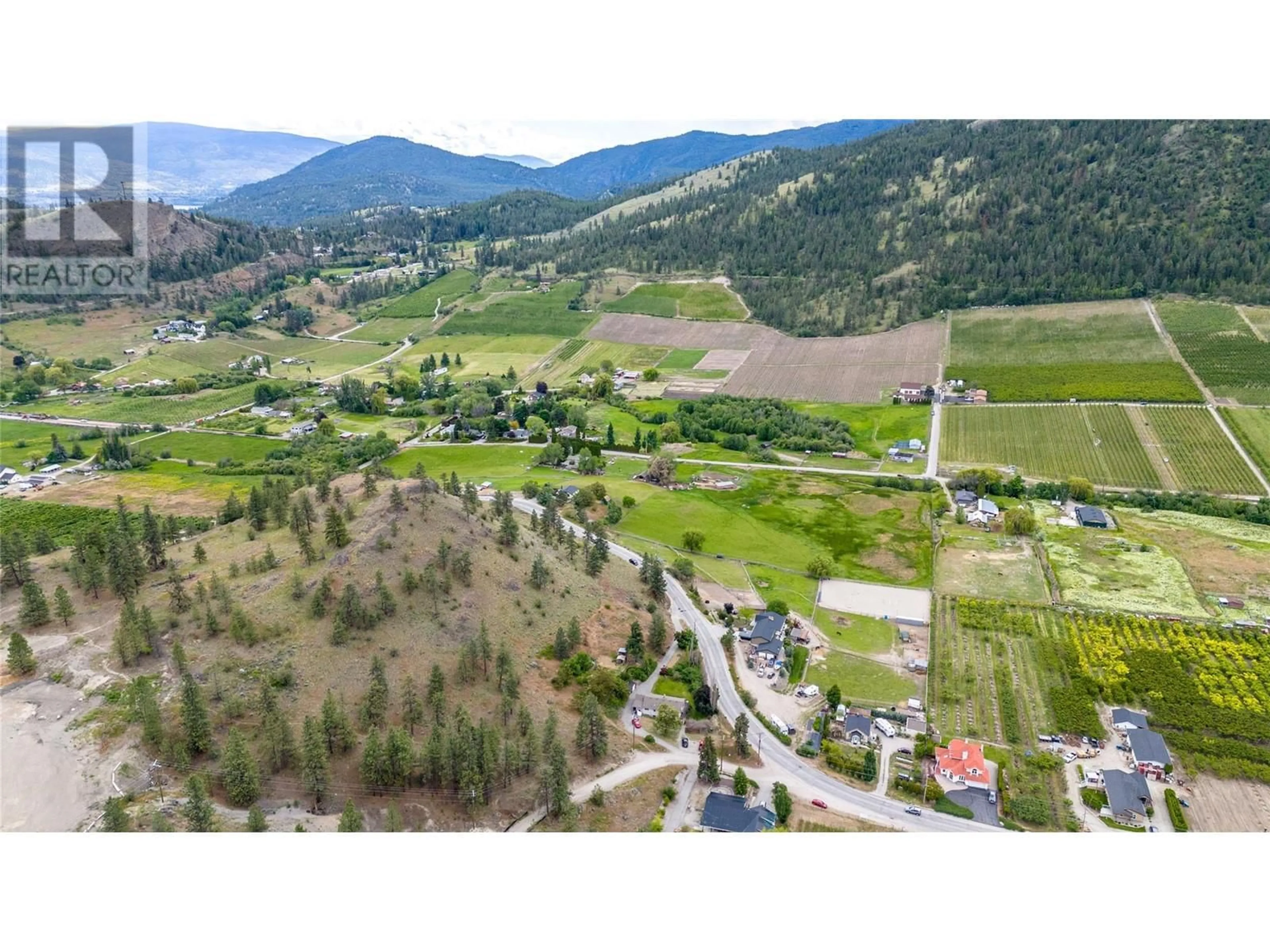 A pic from outside/outdoor area/front of a property/back of a property/a pic from drone, mountain view for 13316 Prairie Valley Road, Summerland British Columbia V0H1Z8