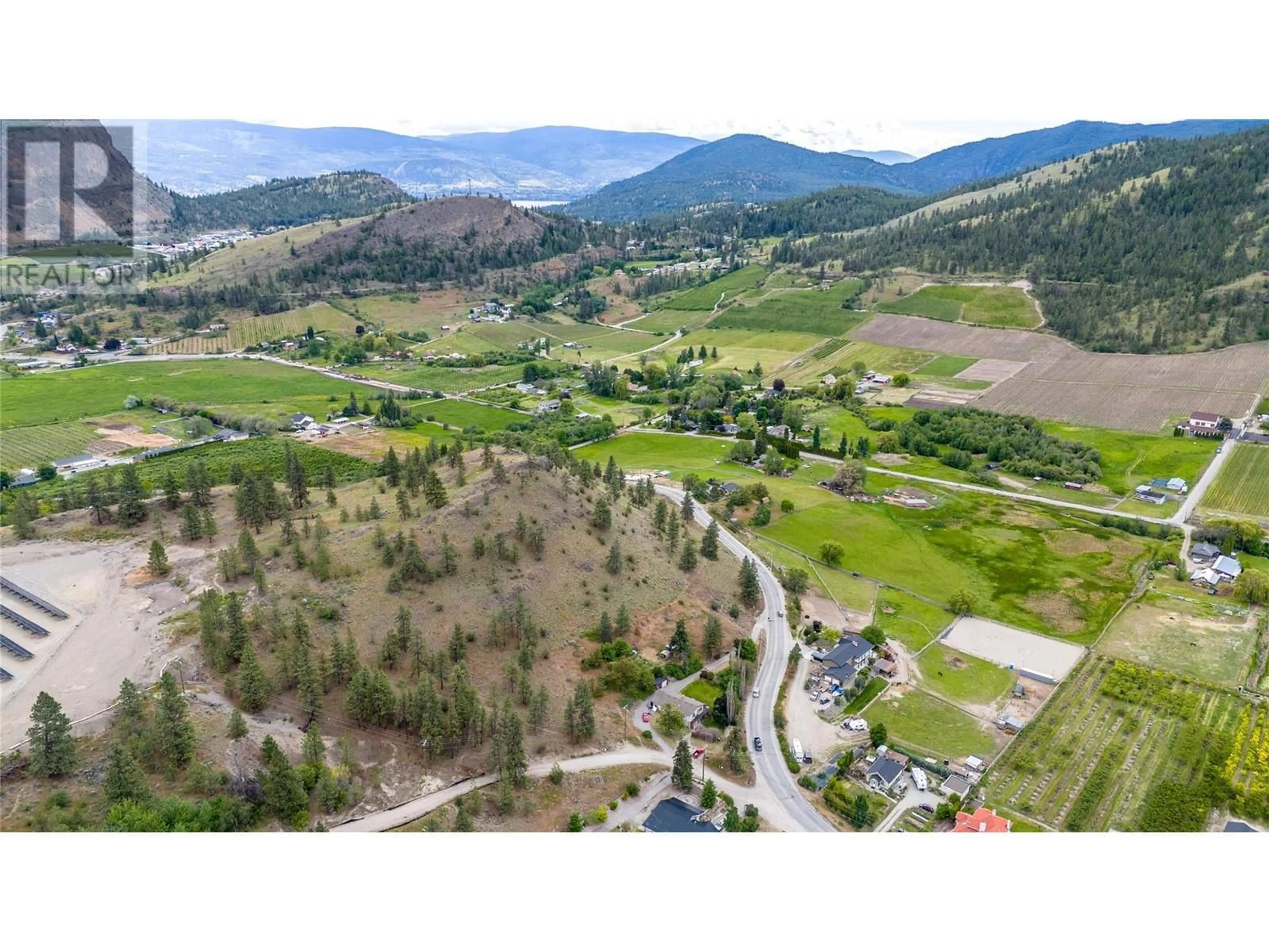 A pic from outside/outdoor area/front of a property/back of a property/a pic from drone, mountain view for 13316 Prairie Valley Road, Summerland British Columbia V0H1Z8