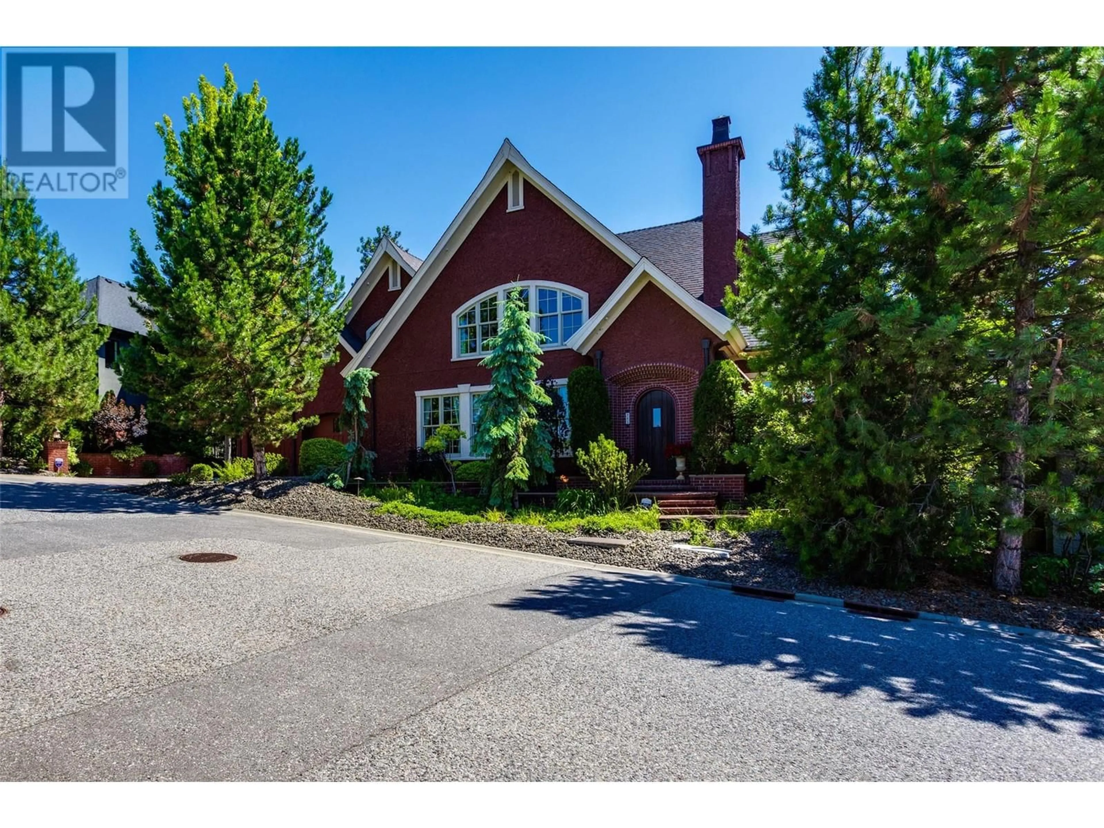 Home with brick exterior material, street for 965 Westpoint Drive, Kelowna British Columbia V1W2Z3