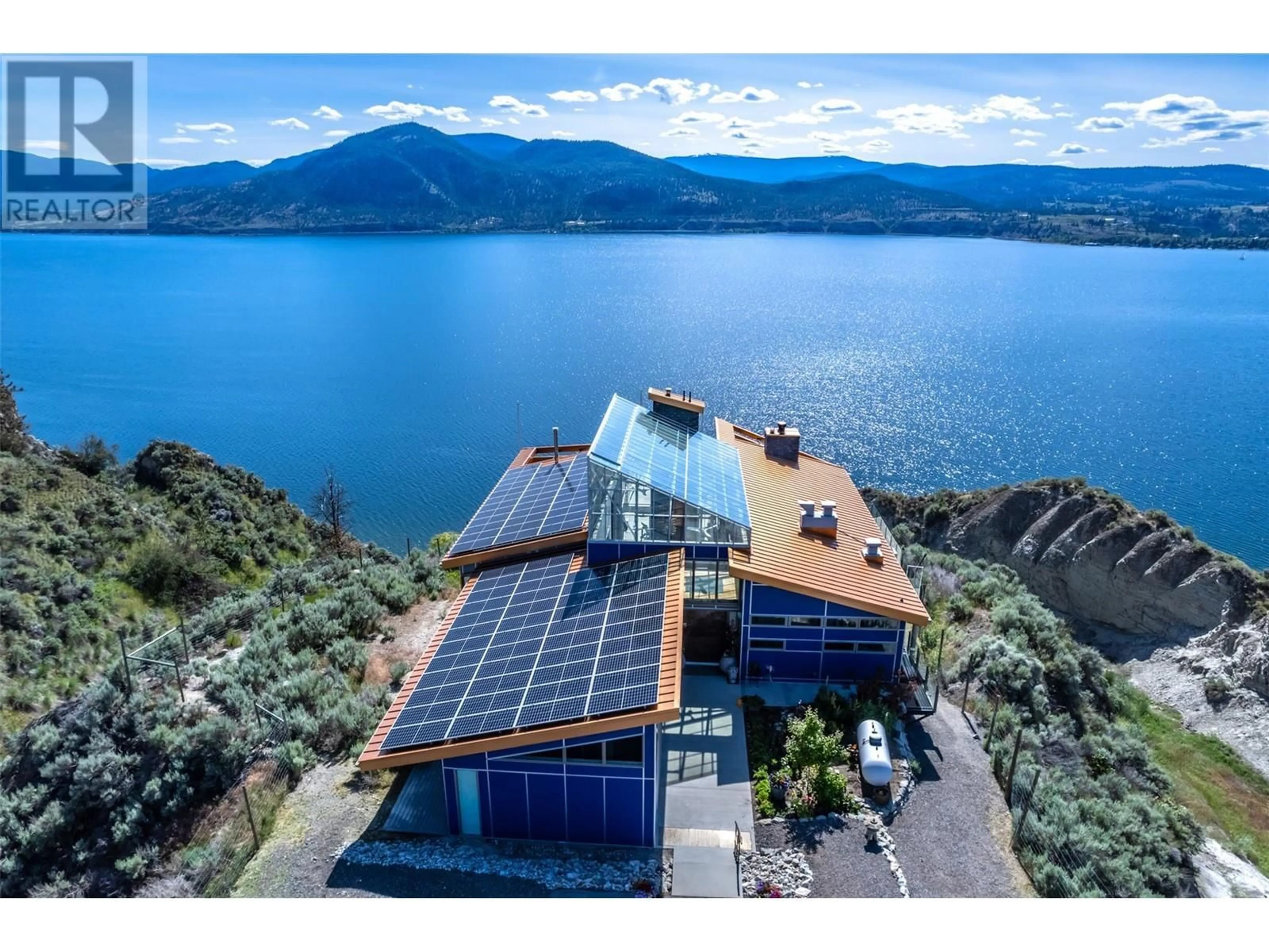 A pic from outside/outdoor area/front of a property/back of a property/a pic from drone, water/lake/river/ocean view for 2185 NARAMATA Road, Naramata British Columbia V0H1N0