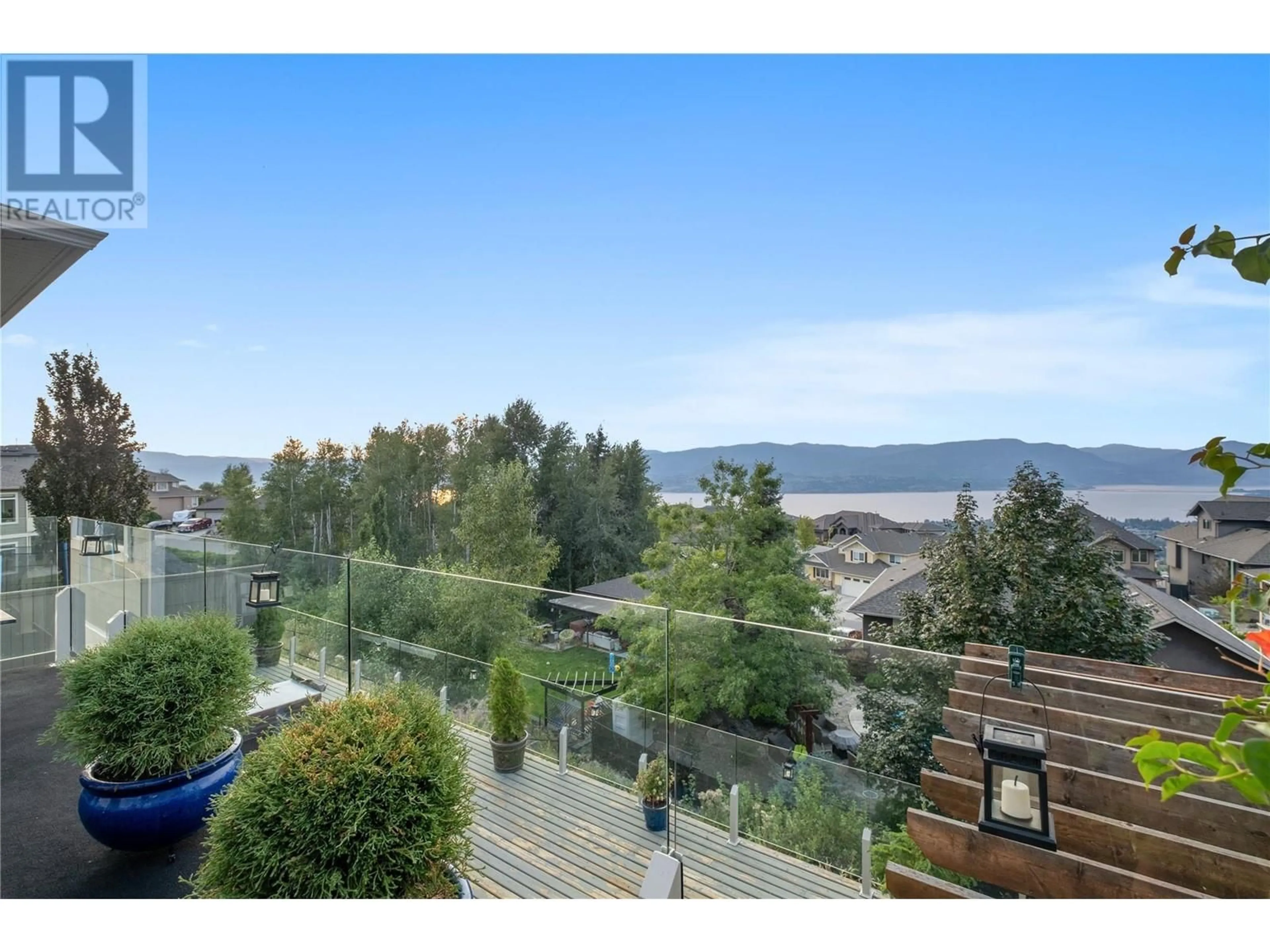 A pic from outside/outdoor area/front of a property/back of a property/a pic from drone, water/lake/river/ocean view for 856 Hewetson Avenue, Kelowna British Columbia V1W5C9