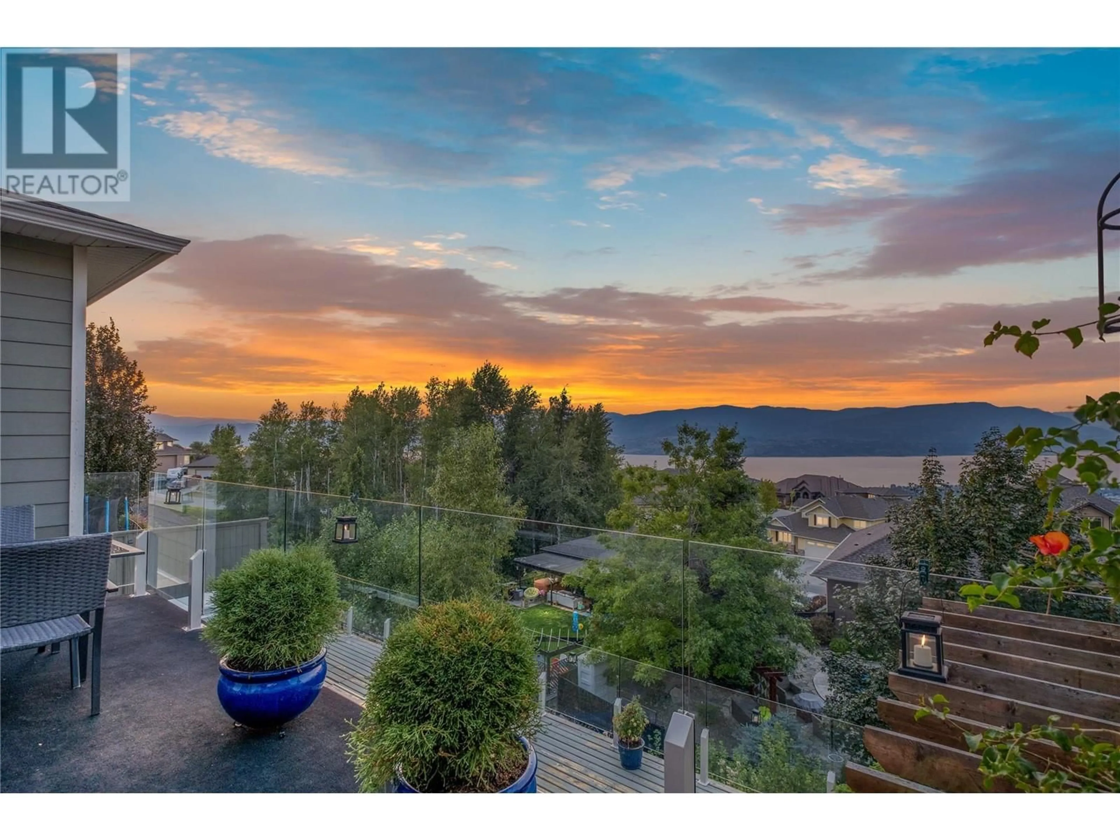 A pic from outside/outdoor area/front of a property/back of a property/a pic from drone, mountain view for 856 Hewetson Avenue, Kelowna British Columbia V1W5C9