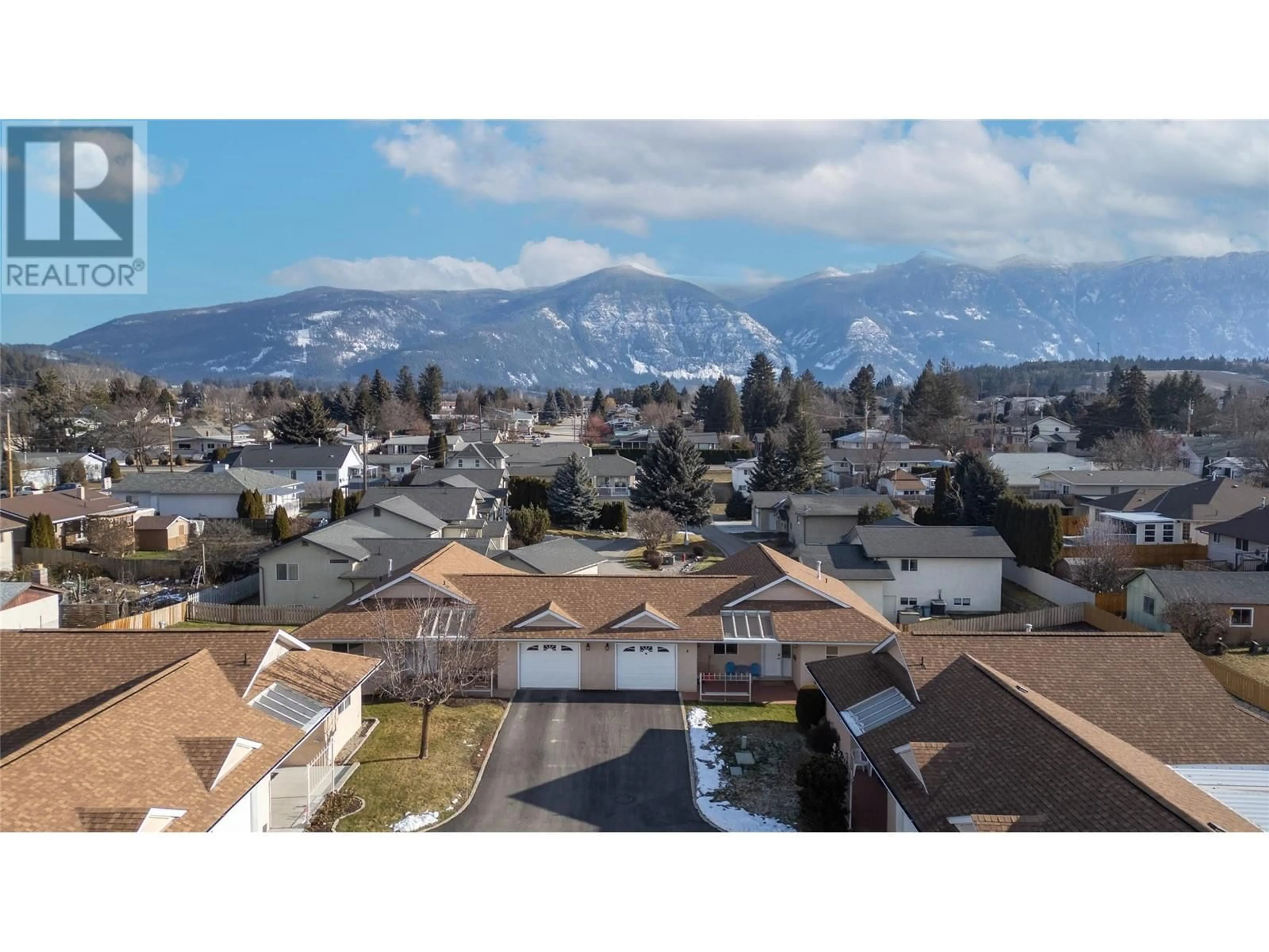 A pic from outside/outdoor area/front of a property/back of a property/a pic from drone, mountain view for 518 18th Avenue S Unit# 6, Creston British Columbia V0B1G5