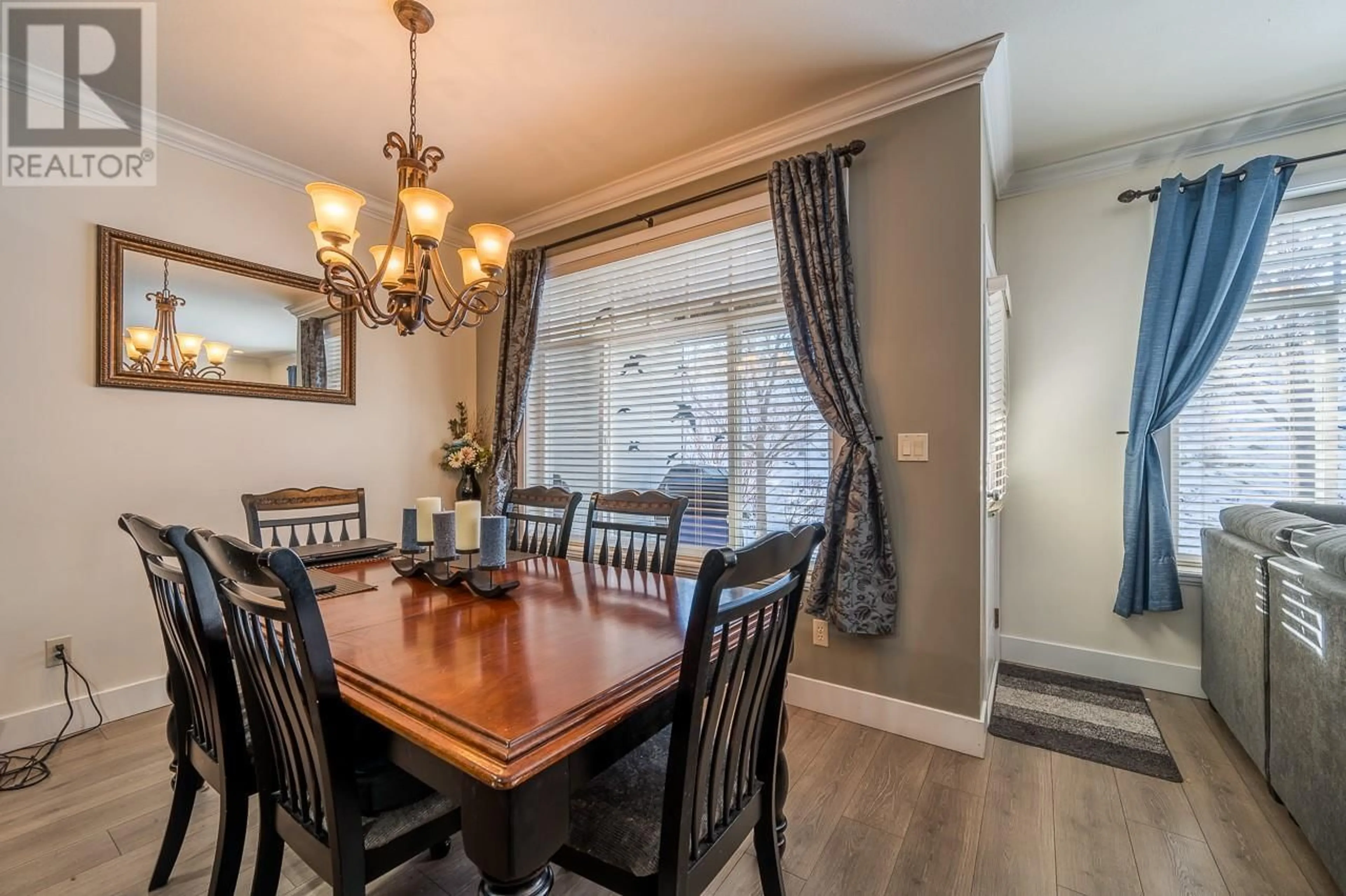 Dining room, wood/laminate floor for 2046 Robson Place Unit# 7, Kamloops British Columbia V2E0A5