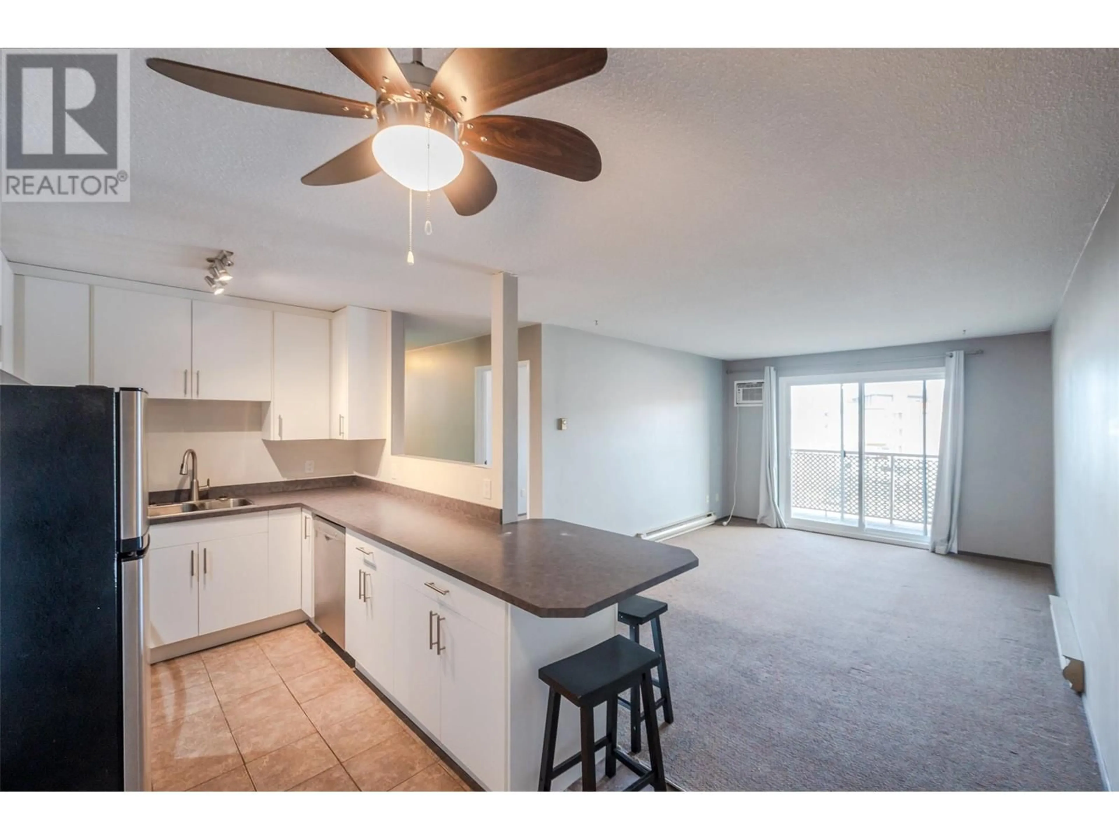 Open concept kitchen, unknown for 408 - 130 SKAHA PLACE, Penticton British Columbia V2A7J6