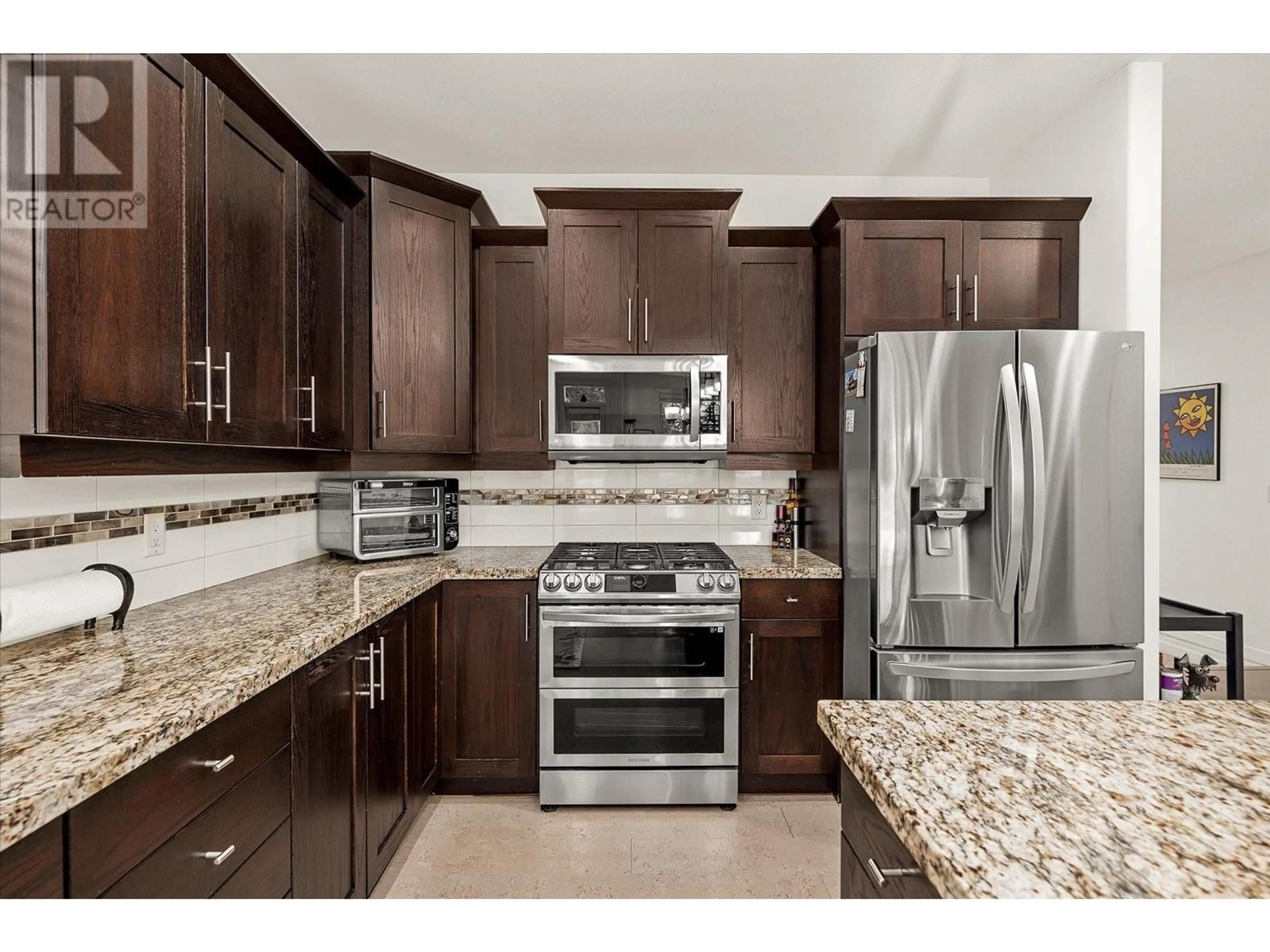 Open concept kitchen, ceramic/tile floor for 2283 Shannon Heights Court Unit# 14, West Kelowna British Columbia V4T3B9