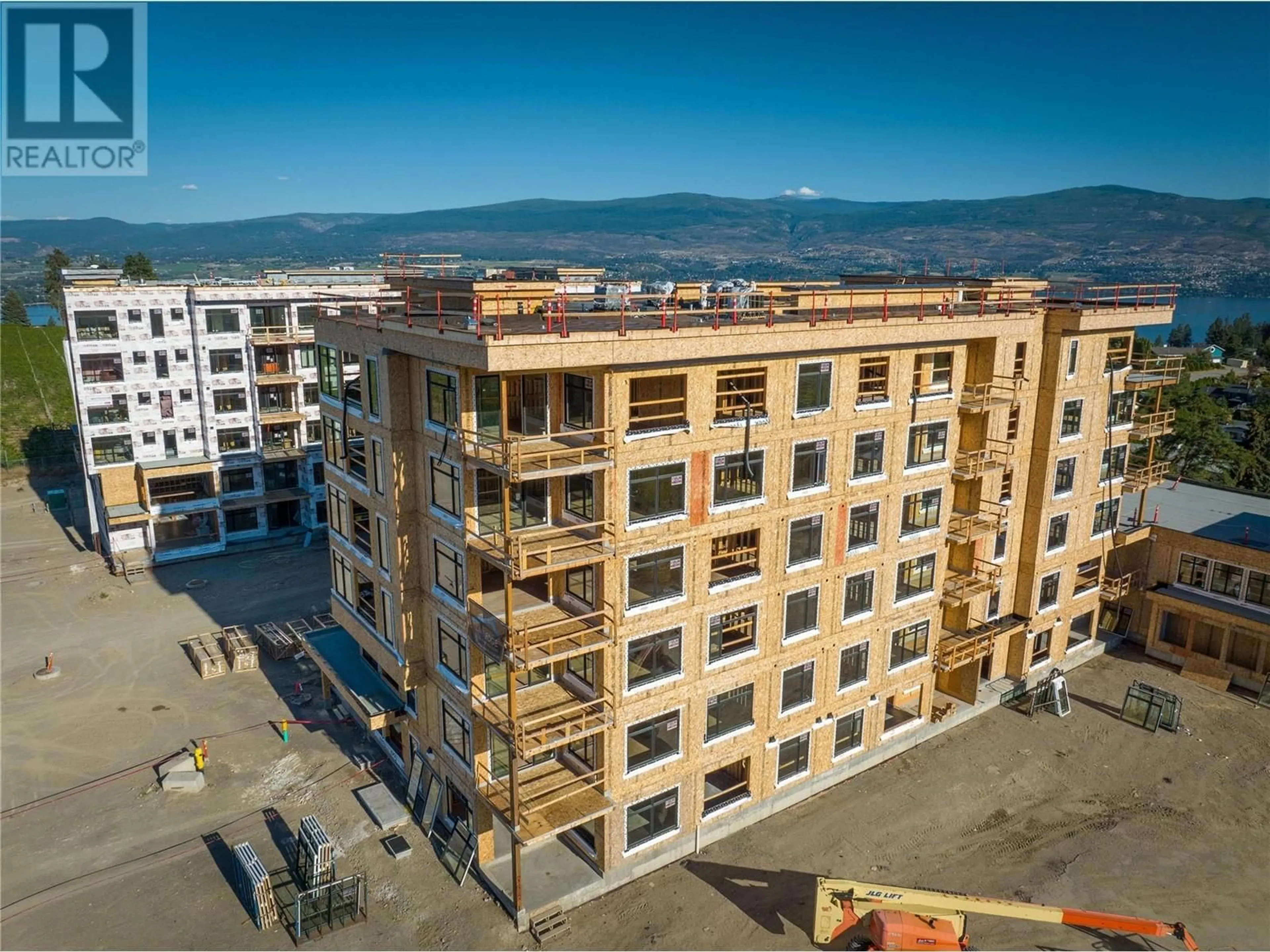 A pic from outside/outdoor area/front of a property/back of a property/a pic from drone, building for 210 - 2760 OLALLA ROAD, West Kelowna British Columbia V1Z2A9