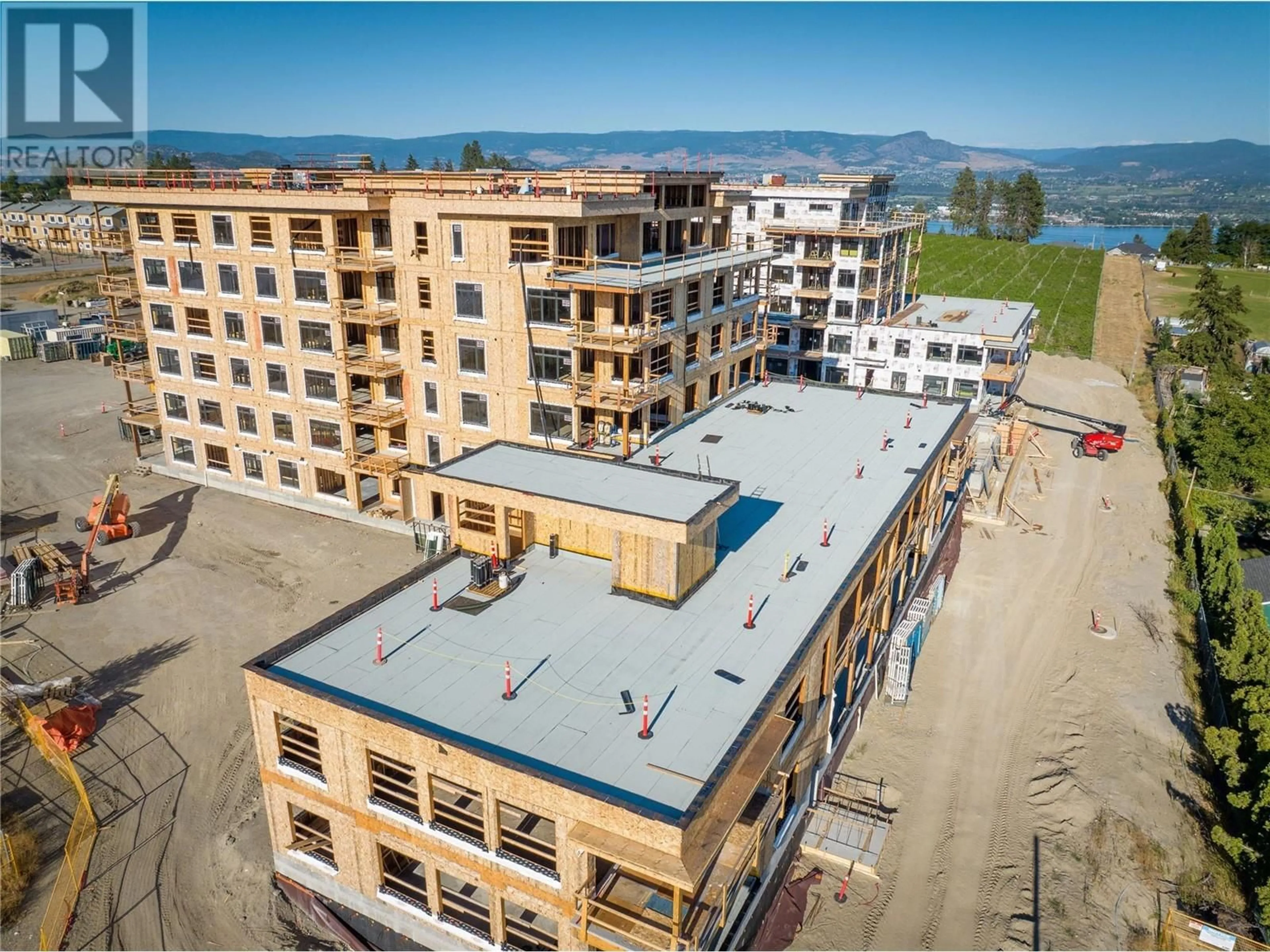 A pic from outside/outdoor area/front of a property/back of a property/a pic from drone, building for 210 - 2760 OLALLA ROAD, West Kelowna British Columbia V1Z2A9