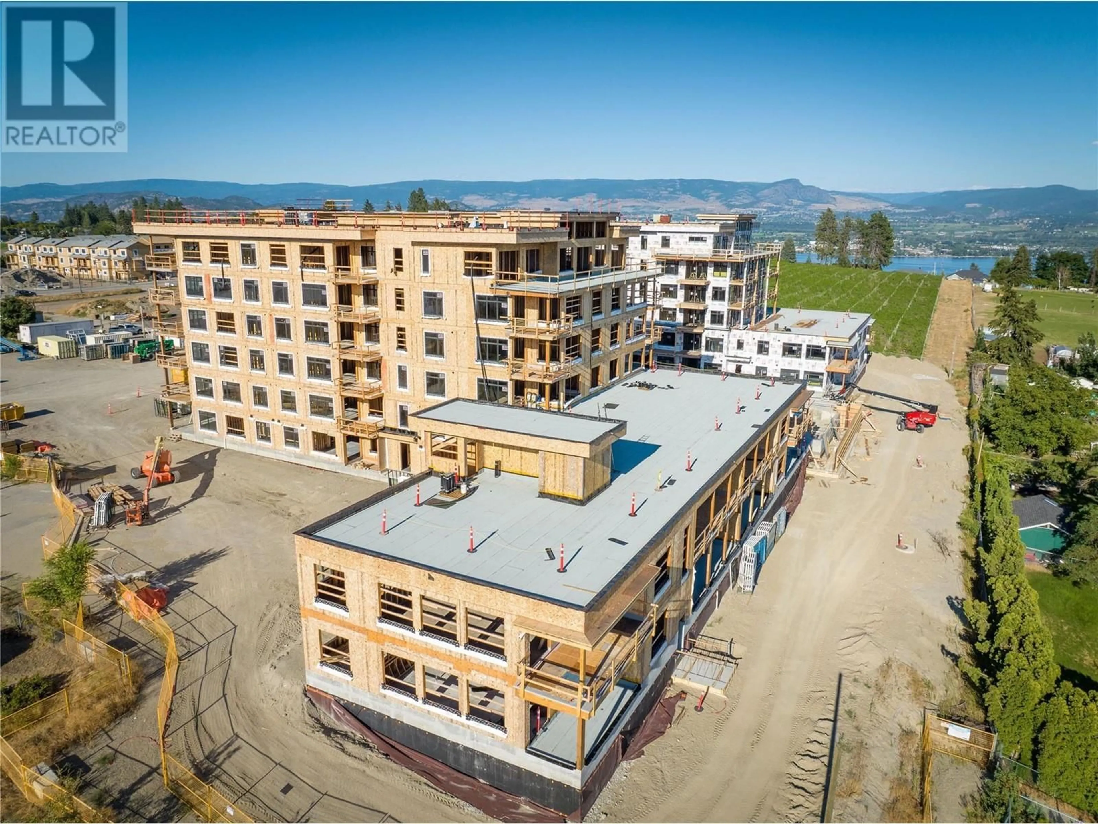 A pic from outside/outdoor area/front of a property/back of a property/a pic from drone, building for 210 - 2760 OLALLA ROAD, West Kelowna British Columbia V1Z2A9