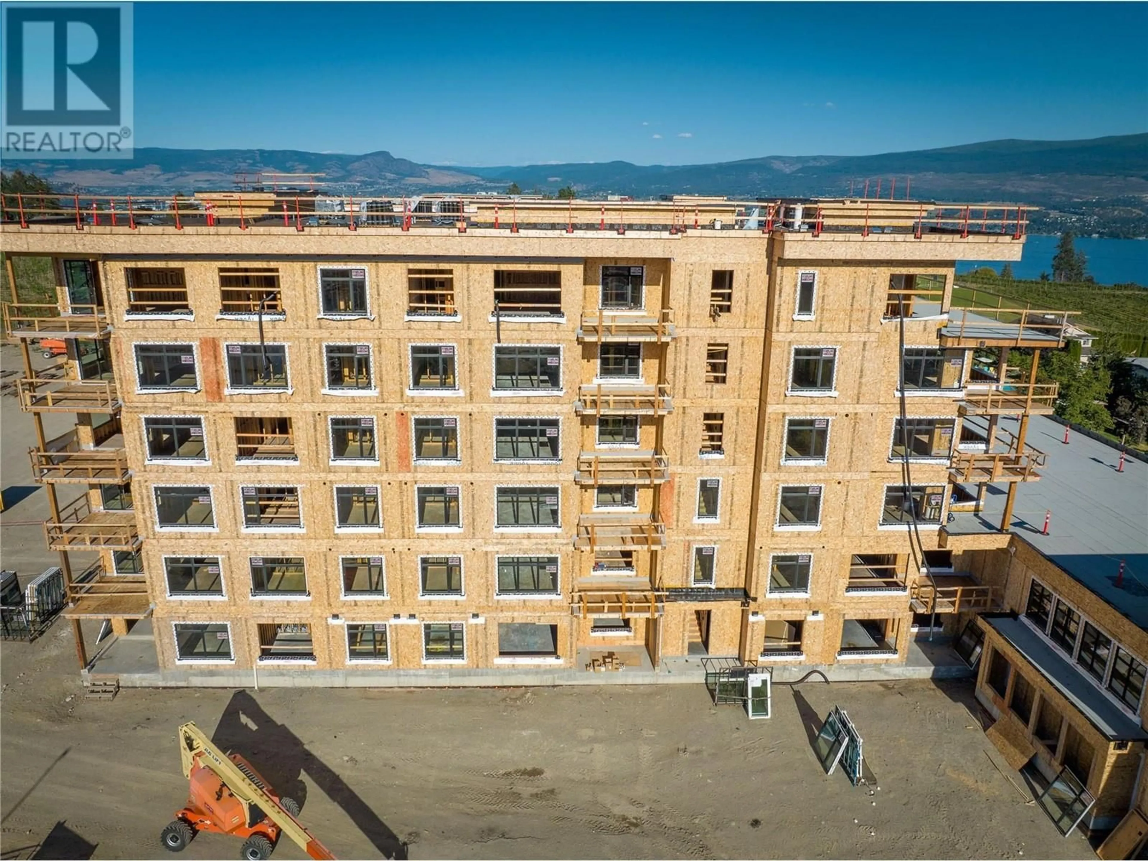 A pic from outside/outdoor area/front of a property/back of a property/a pic from drone, city buildings view from balcony for 2760 Olalla Road Unit# 210, West Kelowna British Columbia V1Z2A9