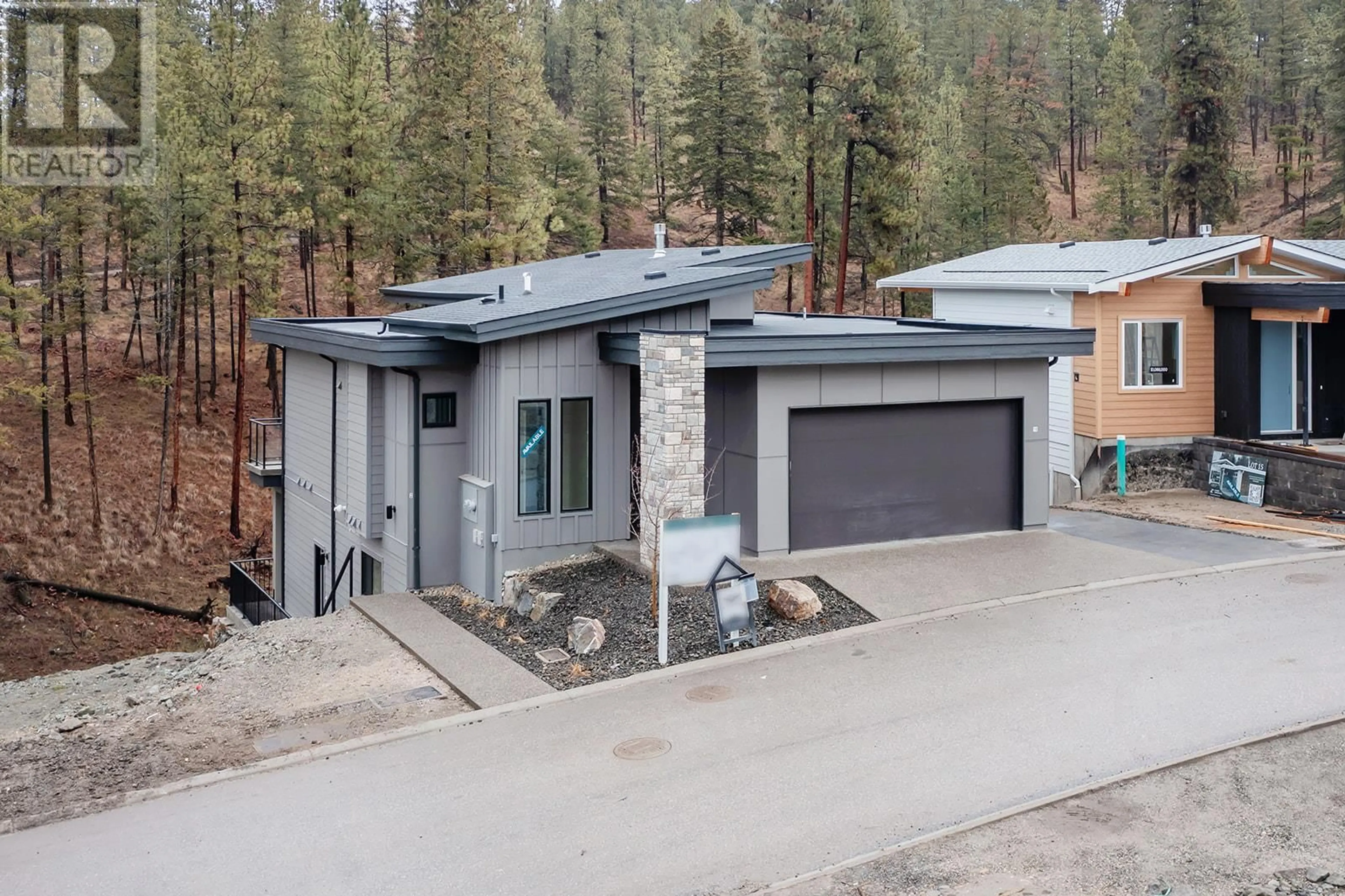 A pic from outside/outdoor area/front of a property/back of a property/a pic from drone, unknown for 1960 Northern Flicker Court Unit# 16, Kelowna British Columbia V1V2B5