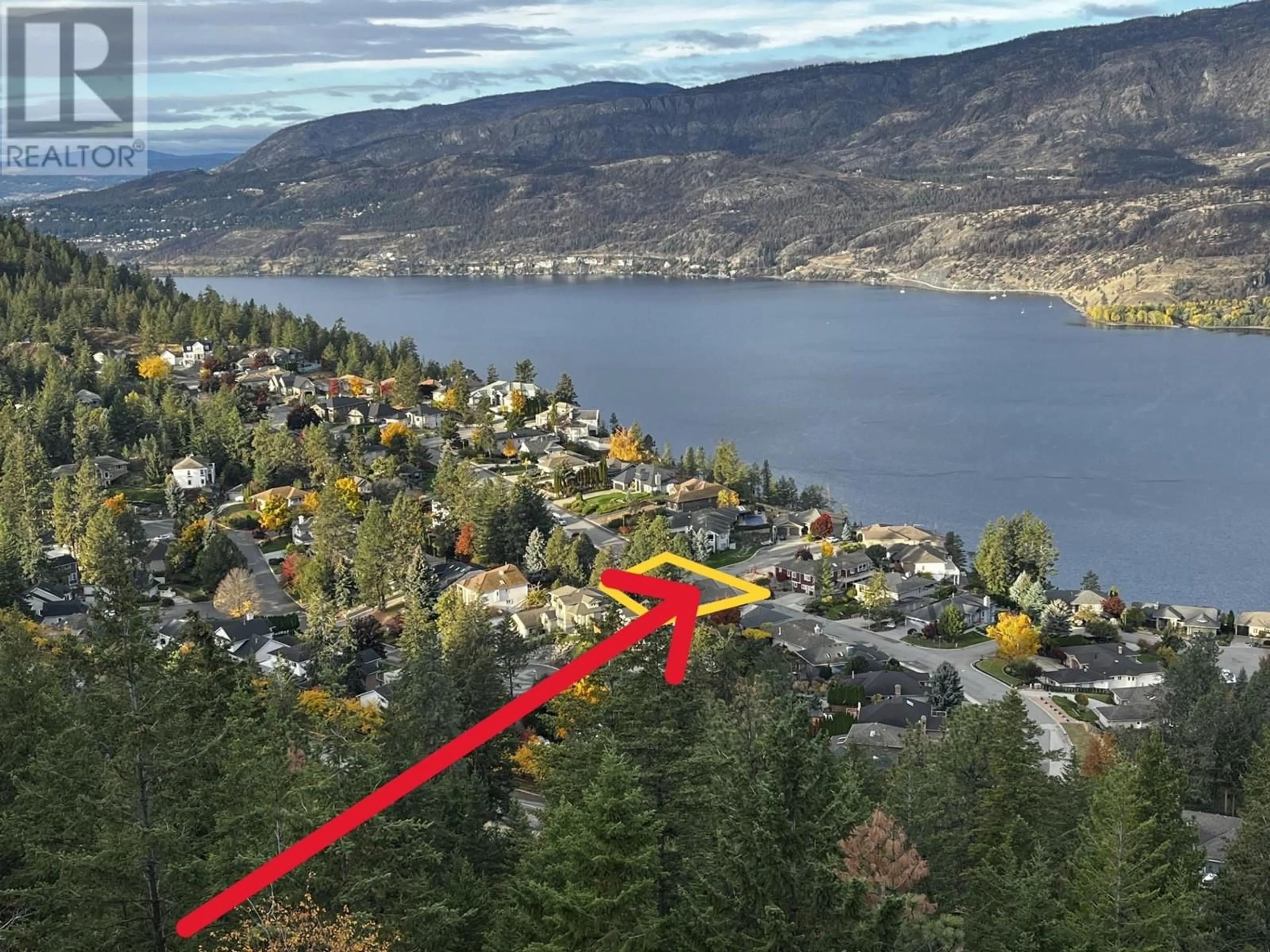 A pic from outside/outdoor area/front of a property/back of a property/a pic from drone, water/lake/river/ocean view for 183 Magic Drive, Kelowna British Columbia V1V1N2