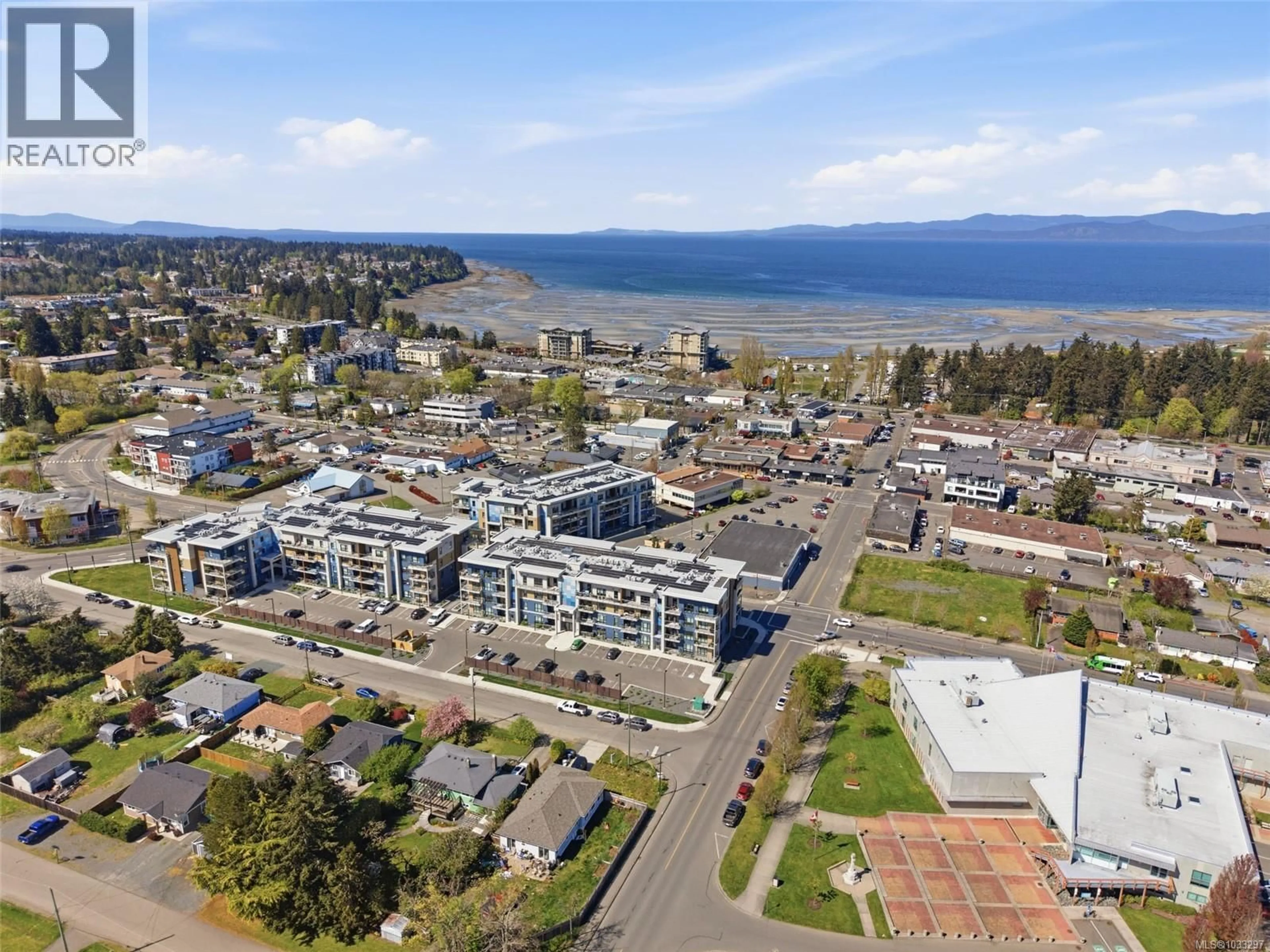 A pic from outside/outdoor area/front of a property/back of a property/a pic from drone, water/lake/river/ocean view for 305 - 120 JENSEN AVENUE WEST, Parksville British Columbia V9P0H6