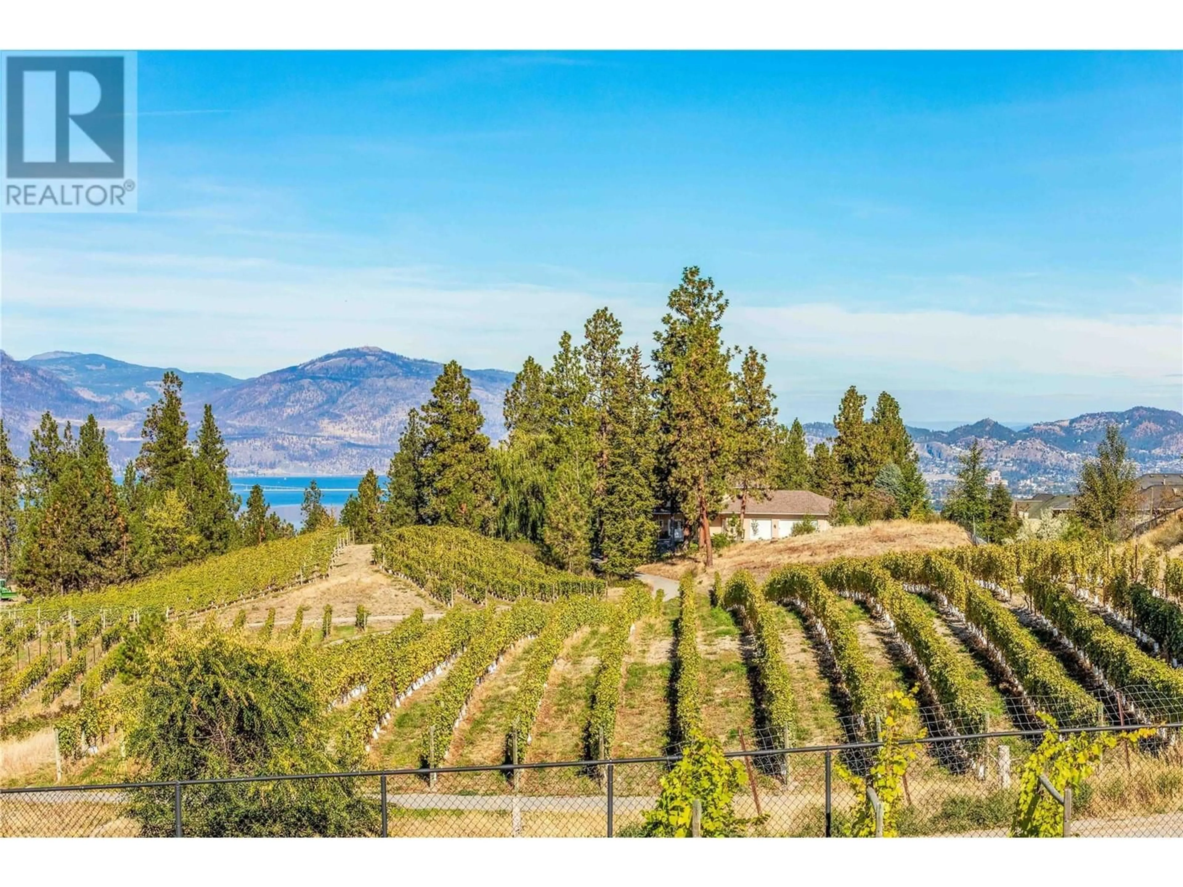 A pic from outside/outdoor area/front of a property/back of a property/a pic from drone, water/lake/river/ocean view for 5016 Seon Crescent, Kelowna British Columbia V1W5G6