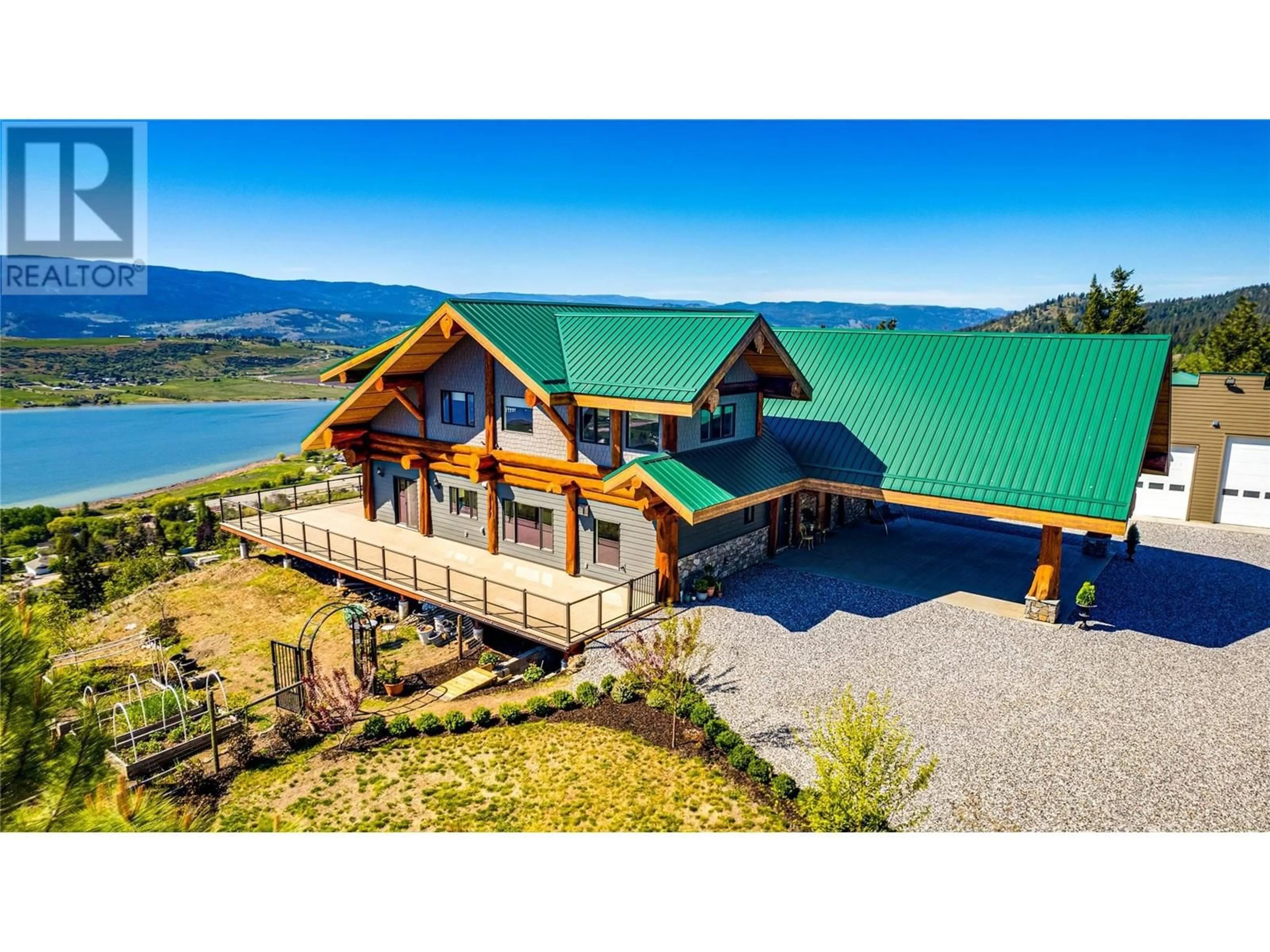 A pic from outside/outdoor area/front of a property/back of a property/a pic from drone, water/lake/river/ocean view for 7410 MCLENNAN ROAD, Vernon British Columbia V1B3S7