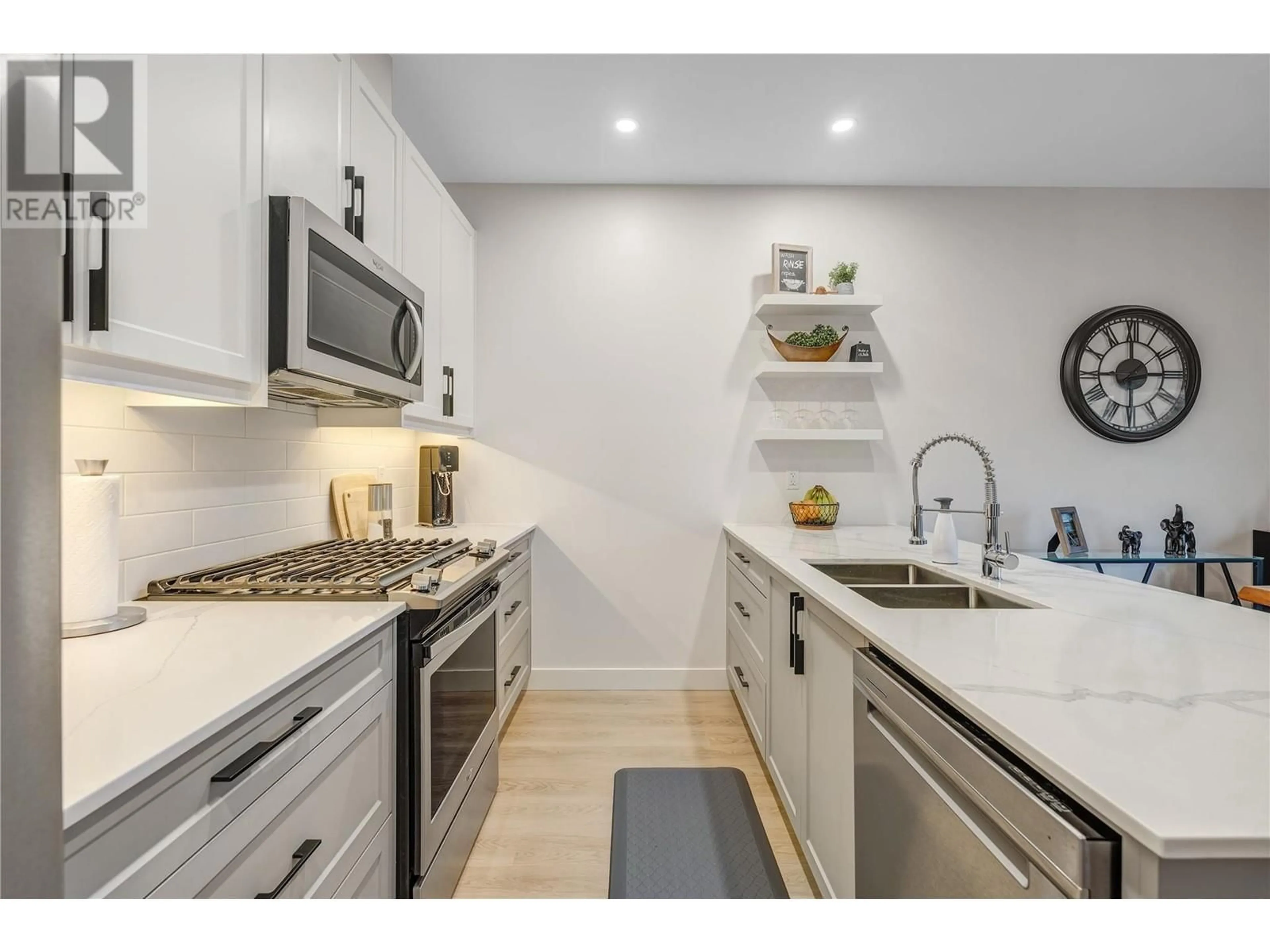 Open concept kitchen, ceramic/tile floor for 5011 Towgood Place Unit# 107, Summerland British Columbia V0H1Z9