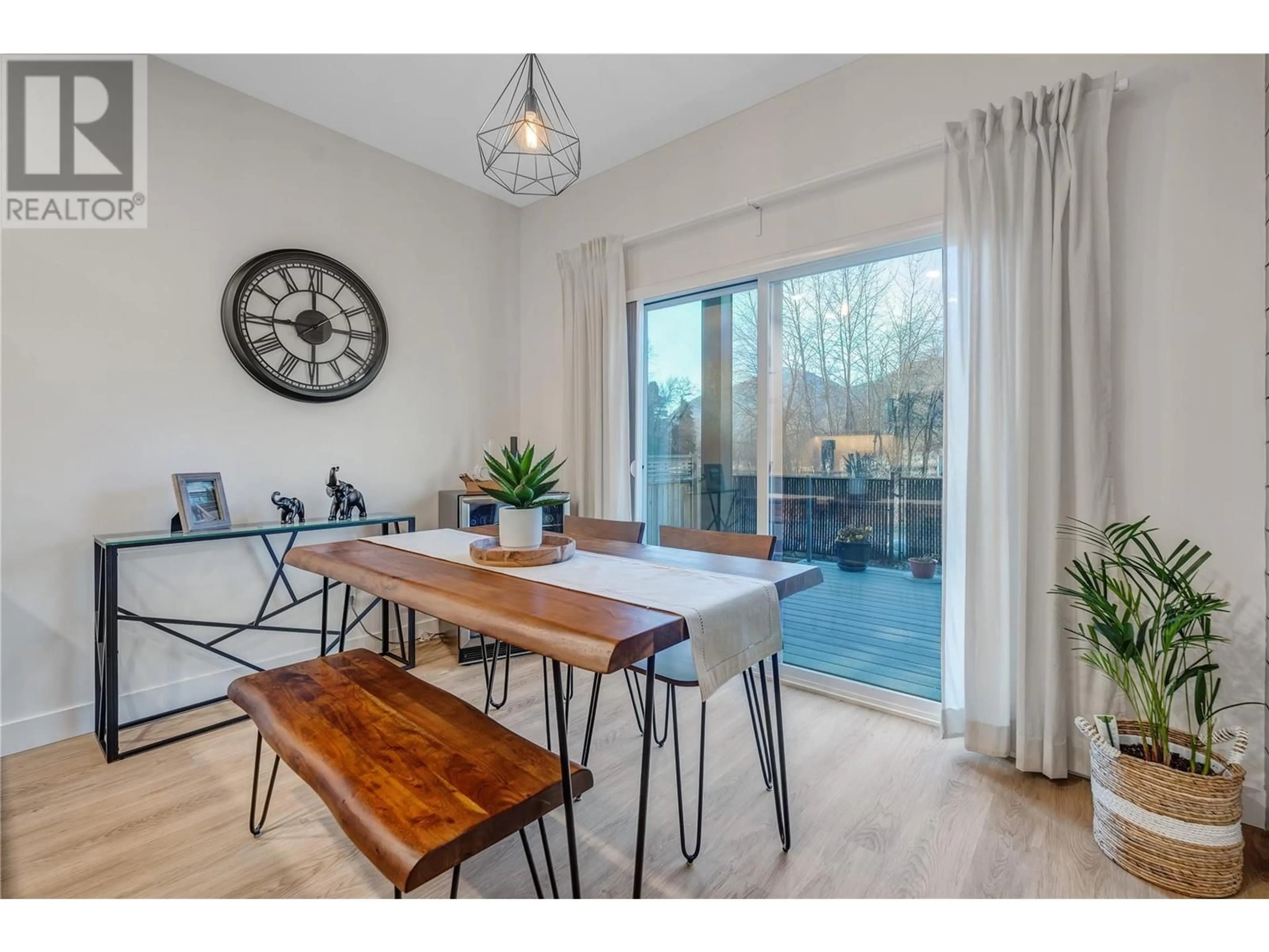 Dining room, wood/laminate floor for 5011 Towgood Place Unit# 107, Summerland British Columbia V0H1Z9