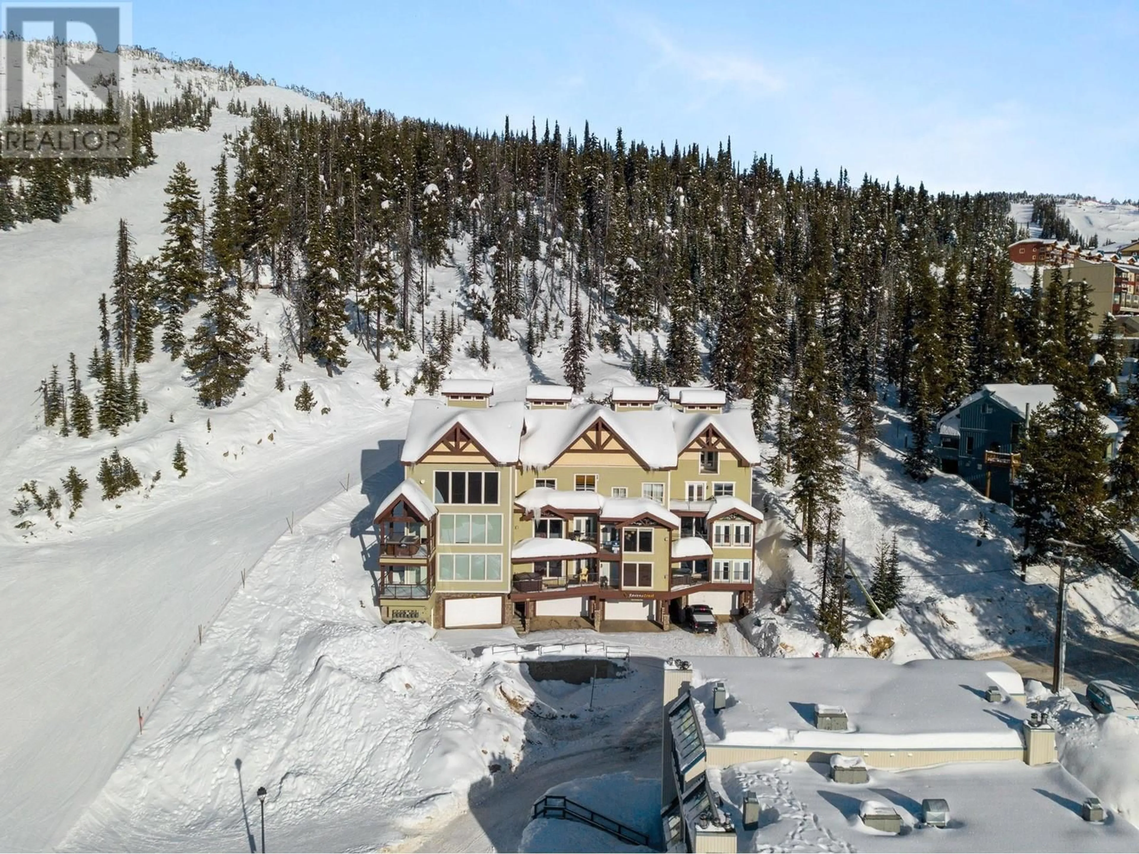 A pic from outside/outdoor area/front of a property/back of a property/a pic from drone, mountain view for 7360 Porcupine Road Unit# 6, Big White British Columbia V1P1P3