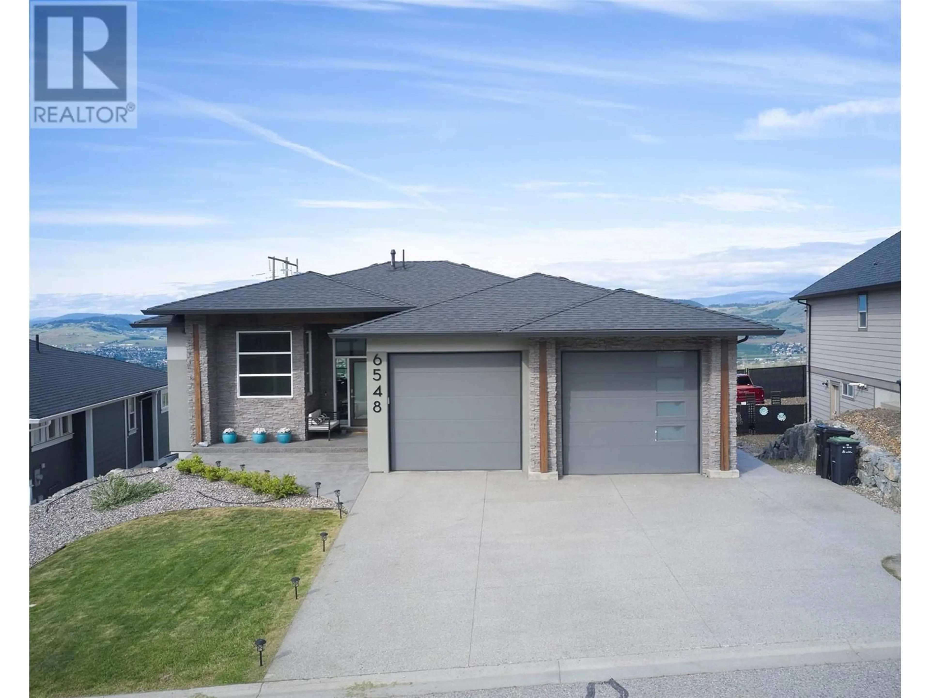 Home with vinyl exterior material, street for 6548 Blackcomb Place, Vernon British Columbia V1B4E1