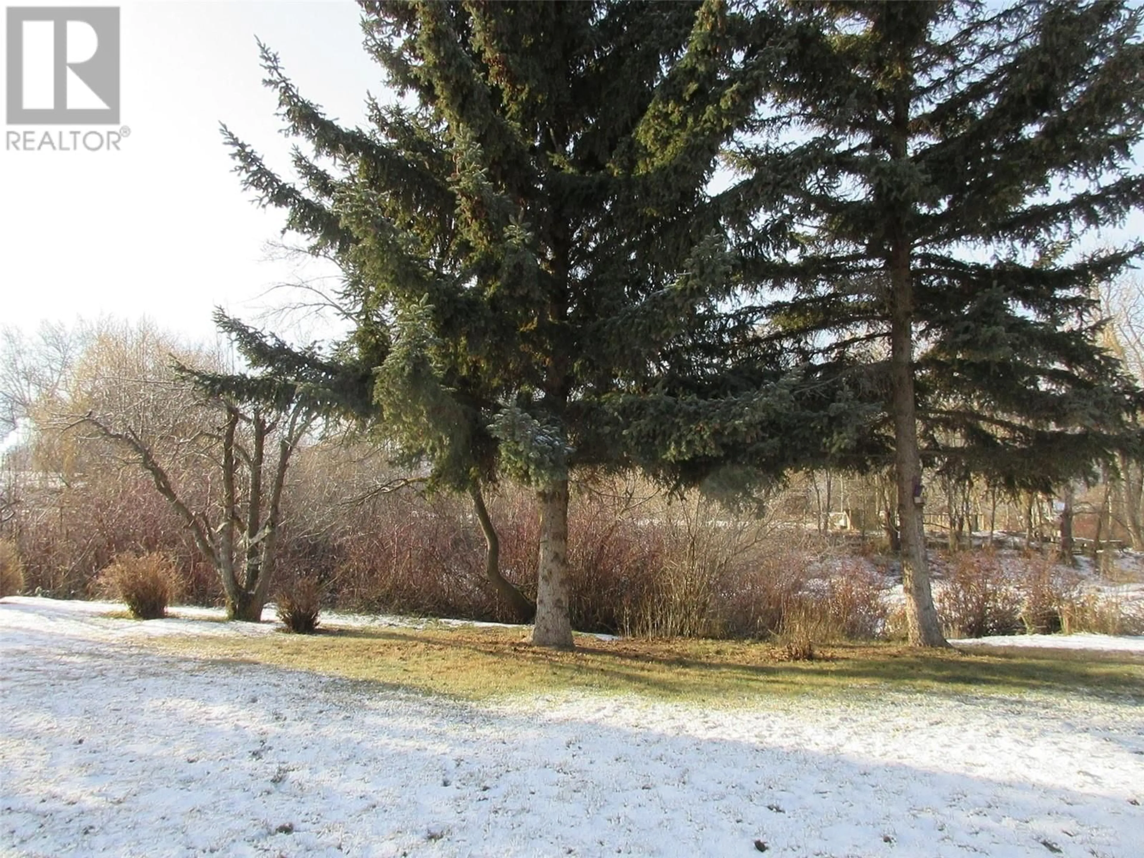 A pic from outside/outdoor area/front of a property/back of a property/a pic from drone, forest/trees view for 3 - 2760 VOGHT STREET, Merritt British Columbia V1K1C8