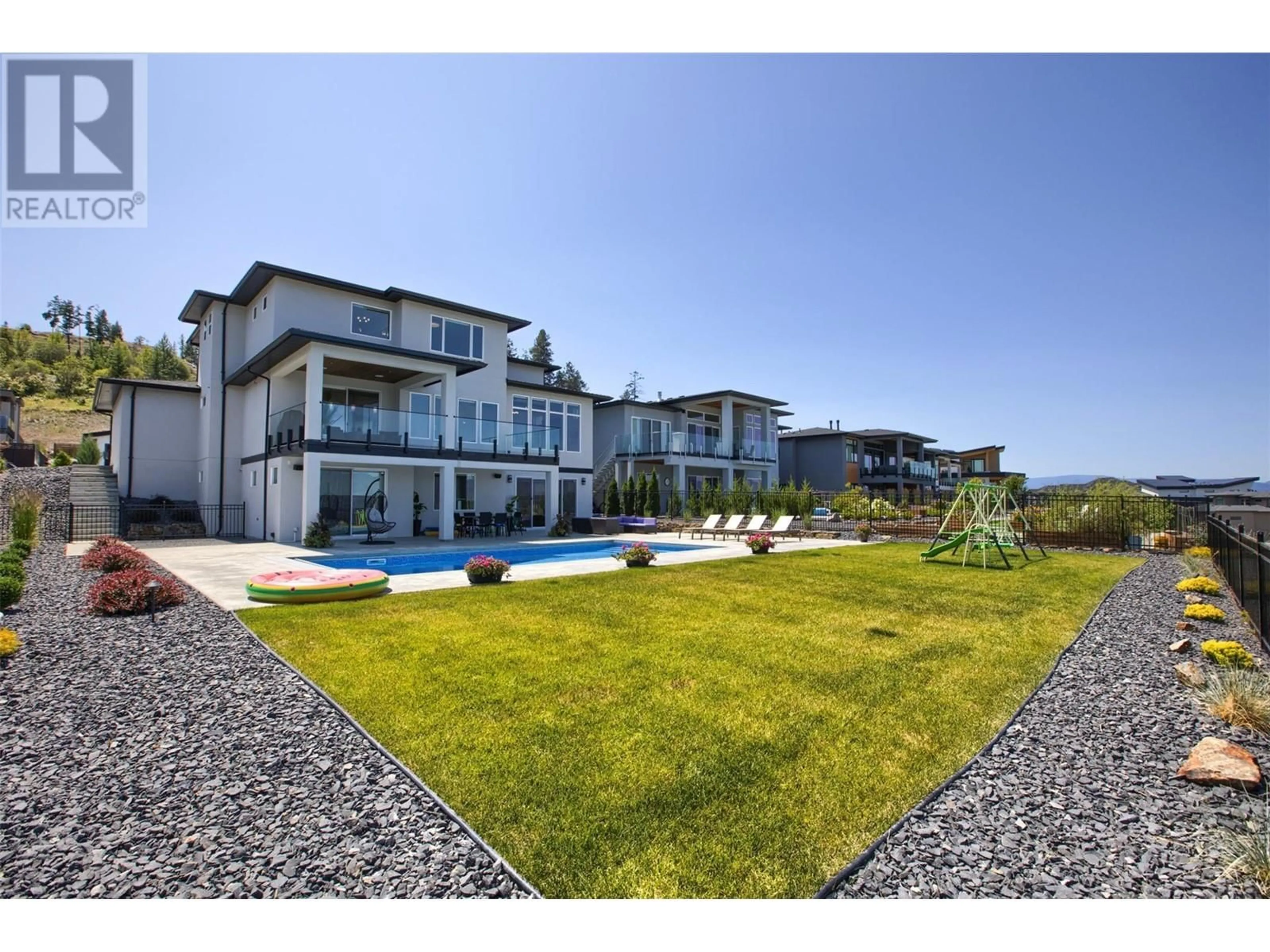 A pic from outside/outdoor area/front of a property/back of a property/a pic from drone, unknown for 446 HAWK HILL DRIVE, Kelowna British Columbia V1W0B1