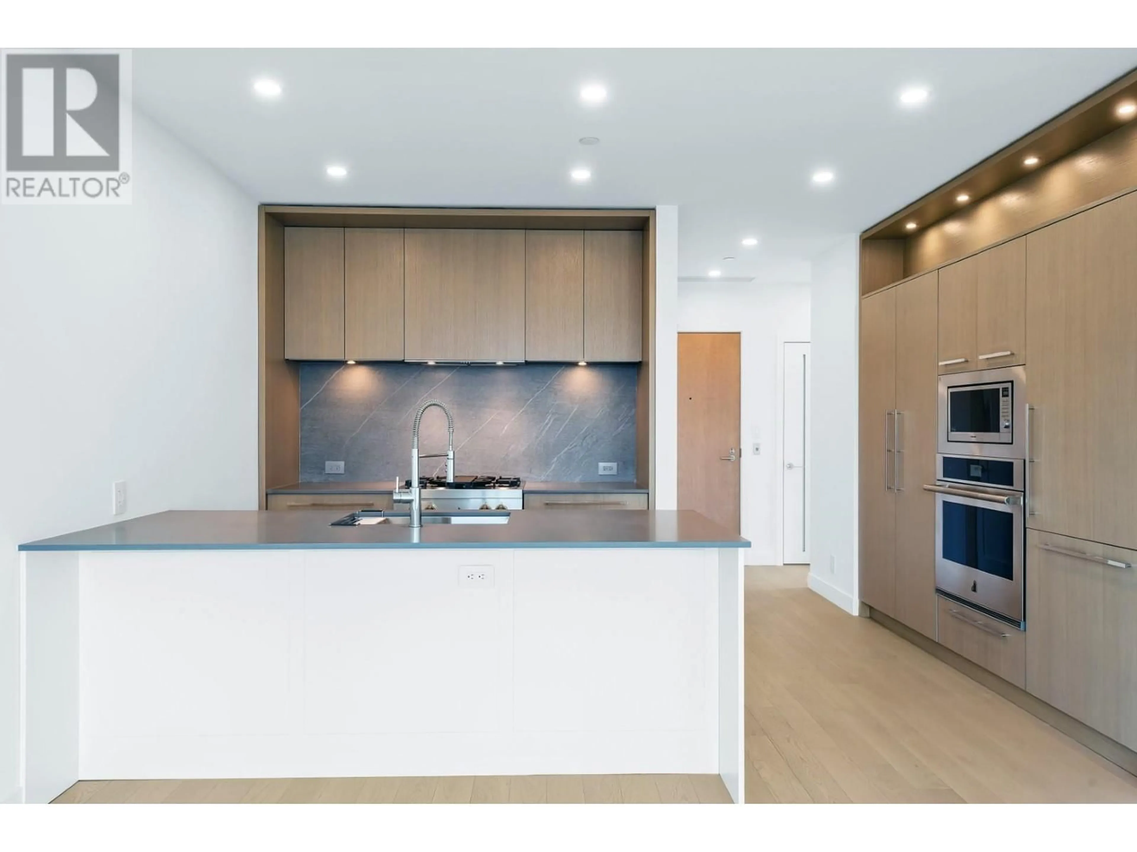 Open concept kitchen, unknown for N508 - 3389 LAKESHORE ROAD, Kelowna British Columbia V1W2R5