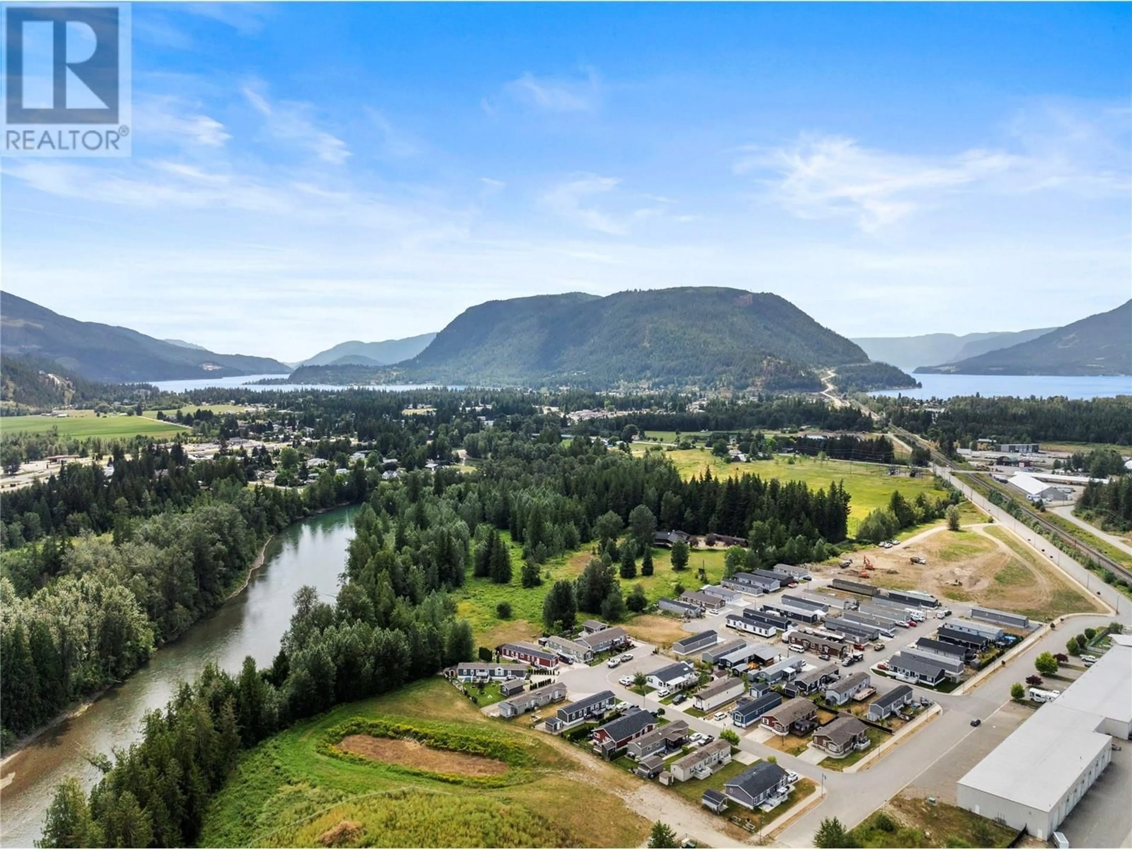 A pic from outside/outdoor area/front of a property/back of a property/a pic from drone, water/lake/river/ocean view for 1705 Hillier Road E Unit# 2, Sicamous British Columbia V0E2V4